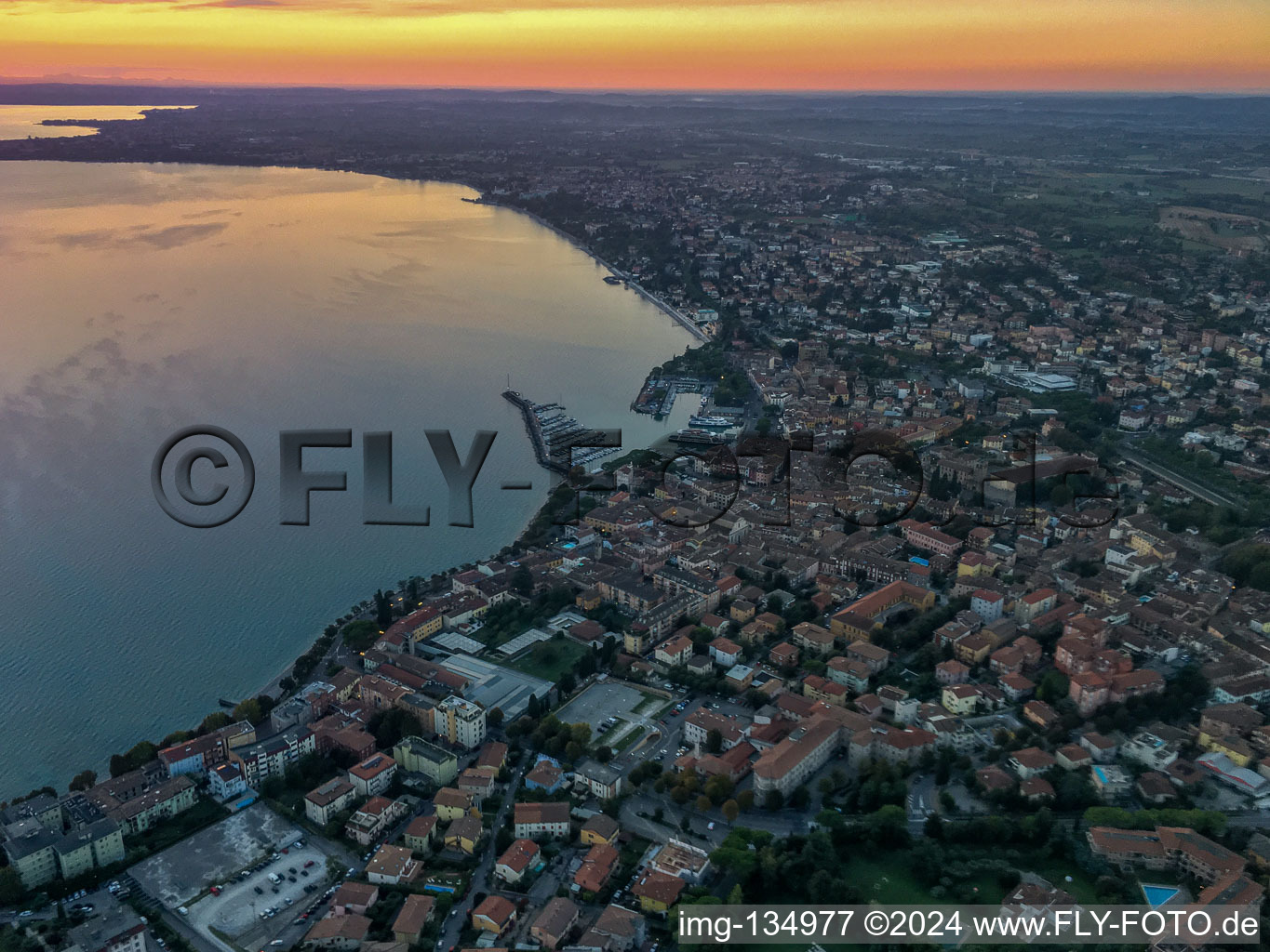 Sunrise at Lake Garda in Desenzano del Garda in the state Brescia, Italy