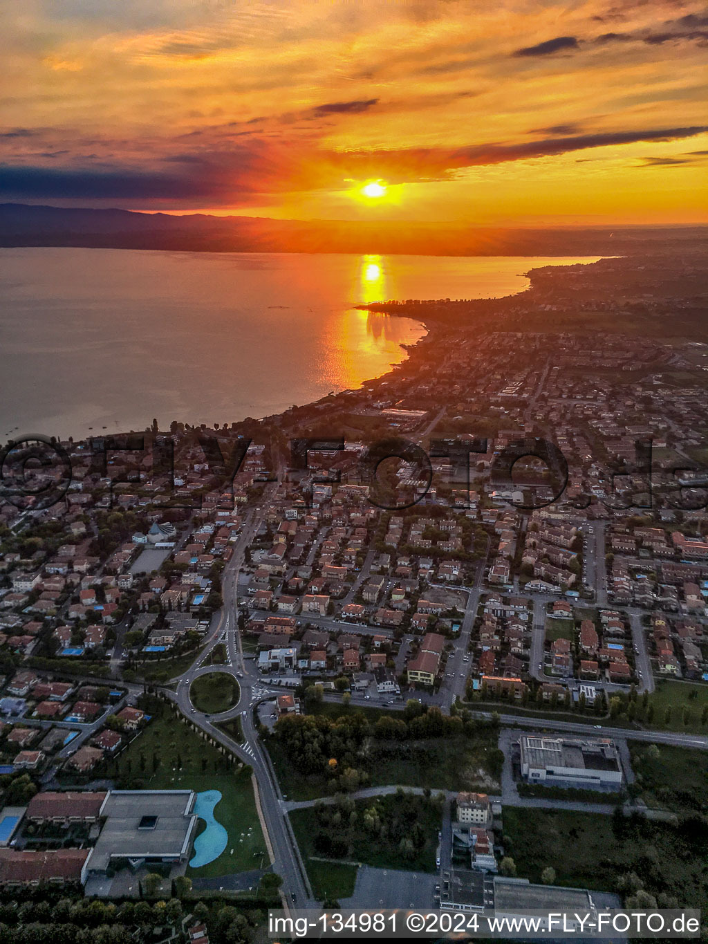 Sunrise at Lake Garda in Sirmione in the state Brescia, Italy