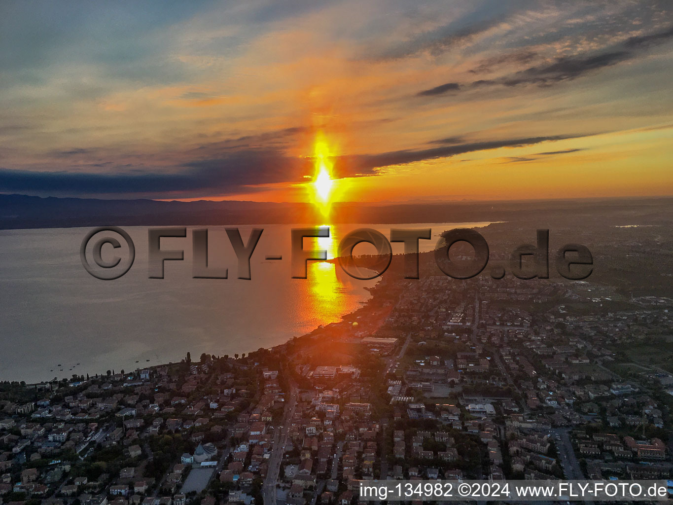 Aerial view of Sunrise at Lake Garda in Sirmione in the state Brescia, Italy