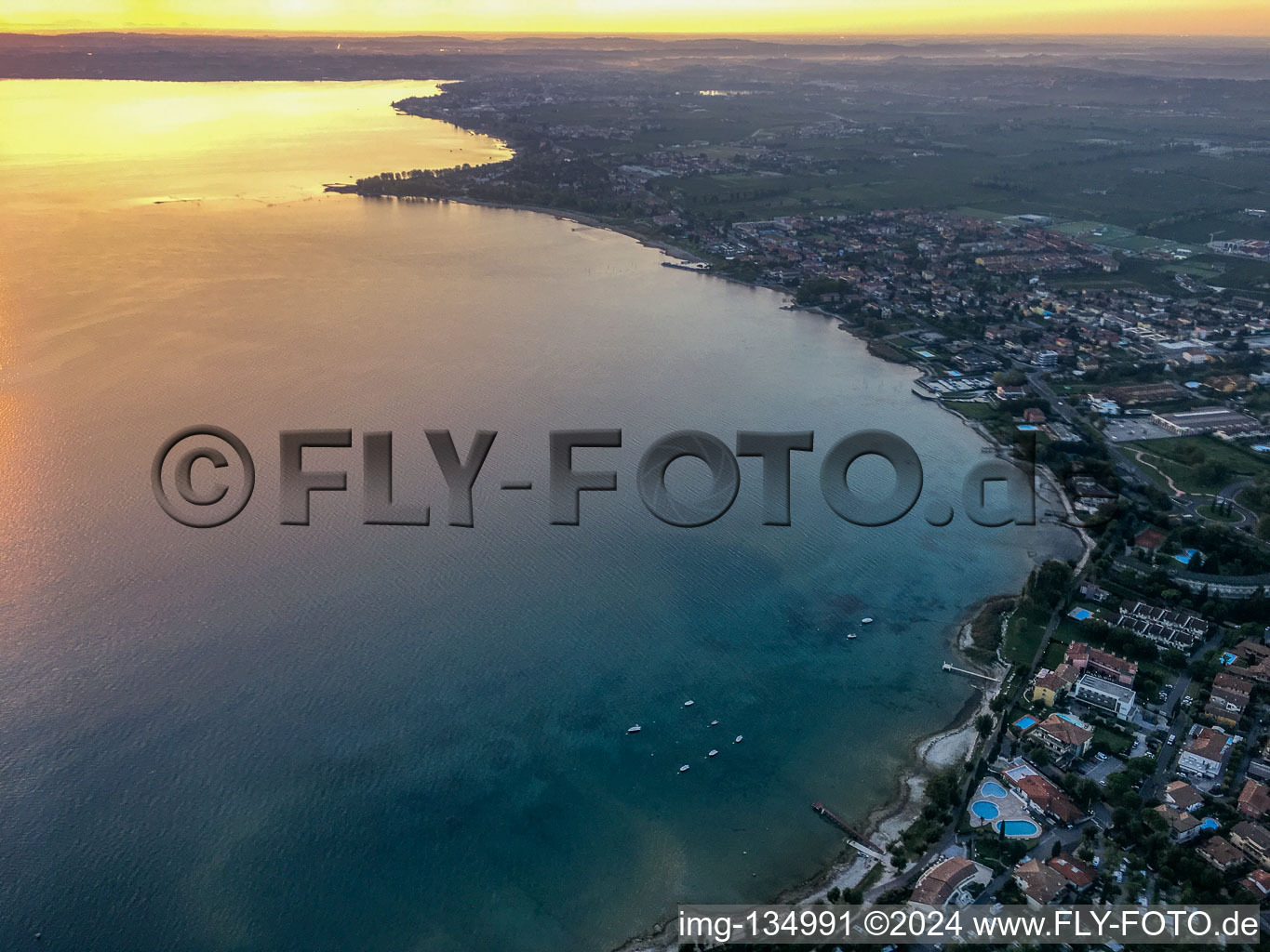 Aerial photograpy of Sunrise at Lake Garda in Sirmione in the state Brescia, Italy