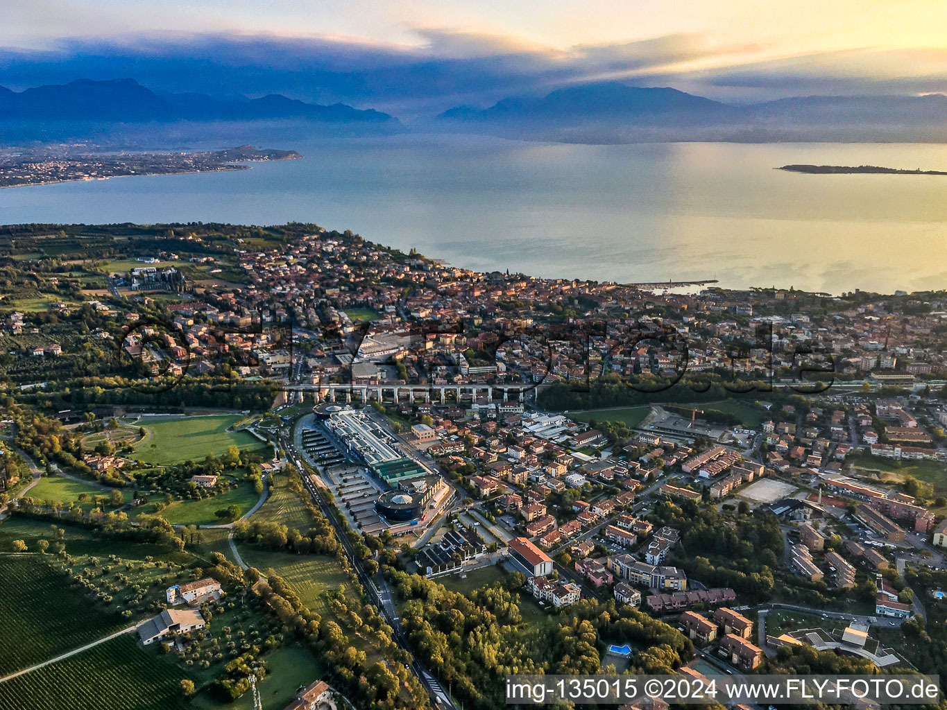 Railway viaduct Viadotto ferroviario di Desenzano on Lake Garda, Complesso Commerciale Le Vele in Desenzano del Garda in the state Brescia, Italy