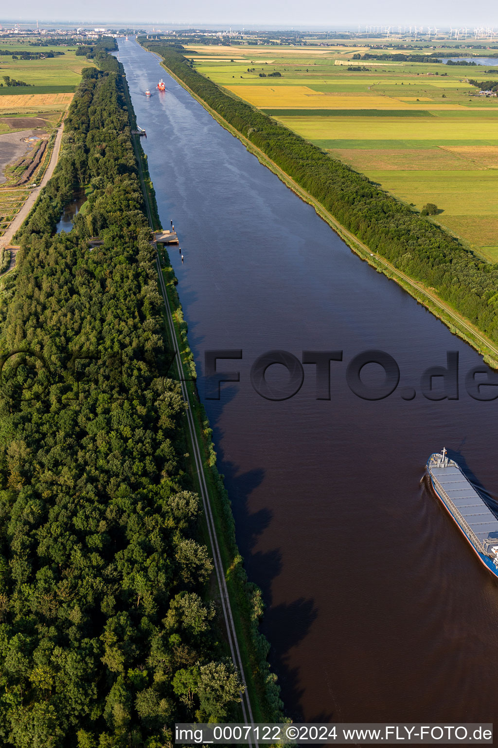 Aerial view of Channel flow and river banks of the waterway shipping Nordostseekanal in Buchholz in the state Schleswig-Holstein, Germany