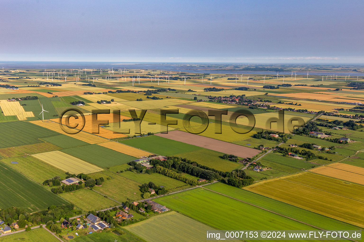 Wind farms at the mouth of the Eider in Neuenkirchen in the state Schleswig Holstein, Germany