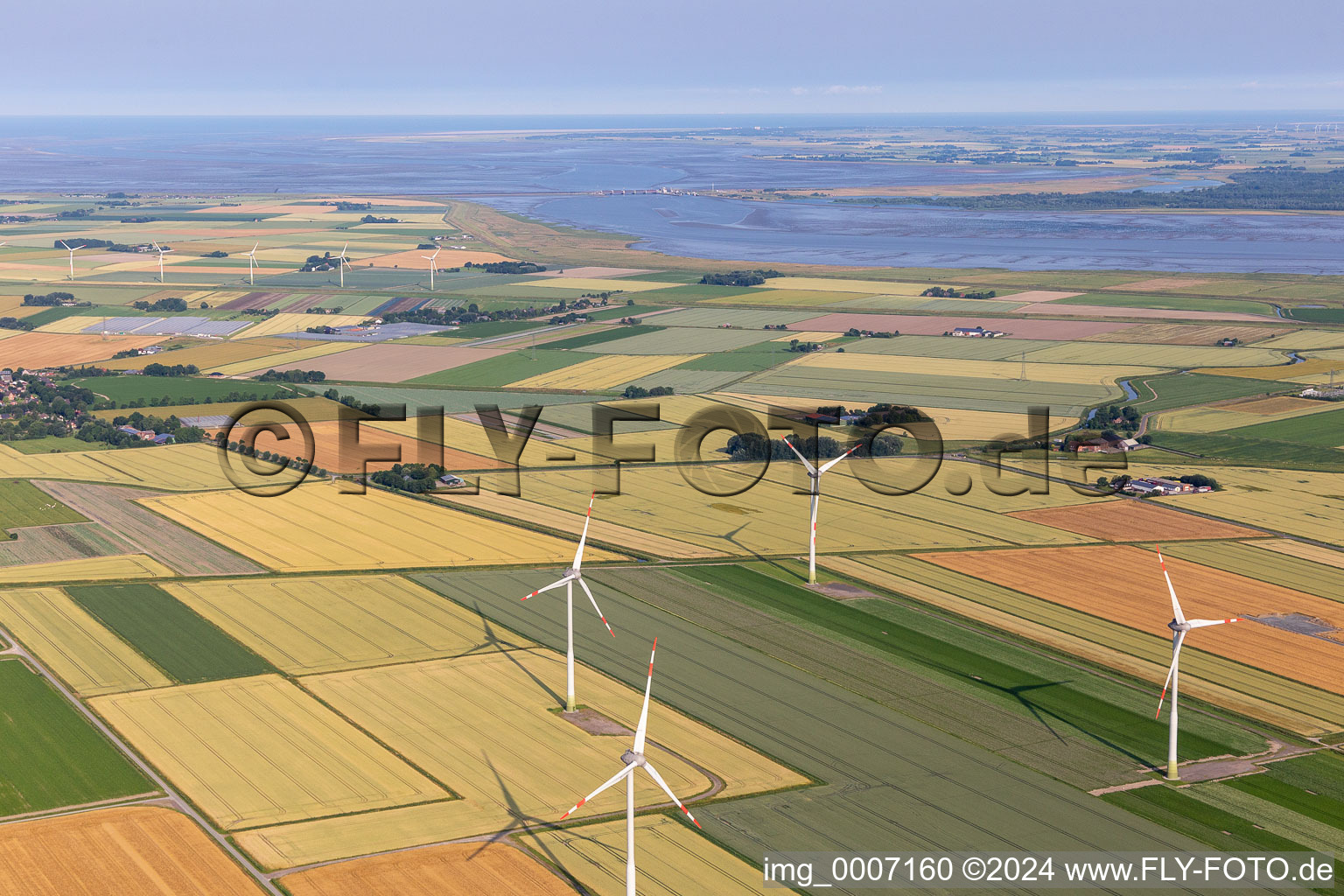 Wind farms at the mouth of the Eider in the district Schülper Altensiel in Schülp in the state Schleswig Holstein, Germany