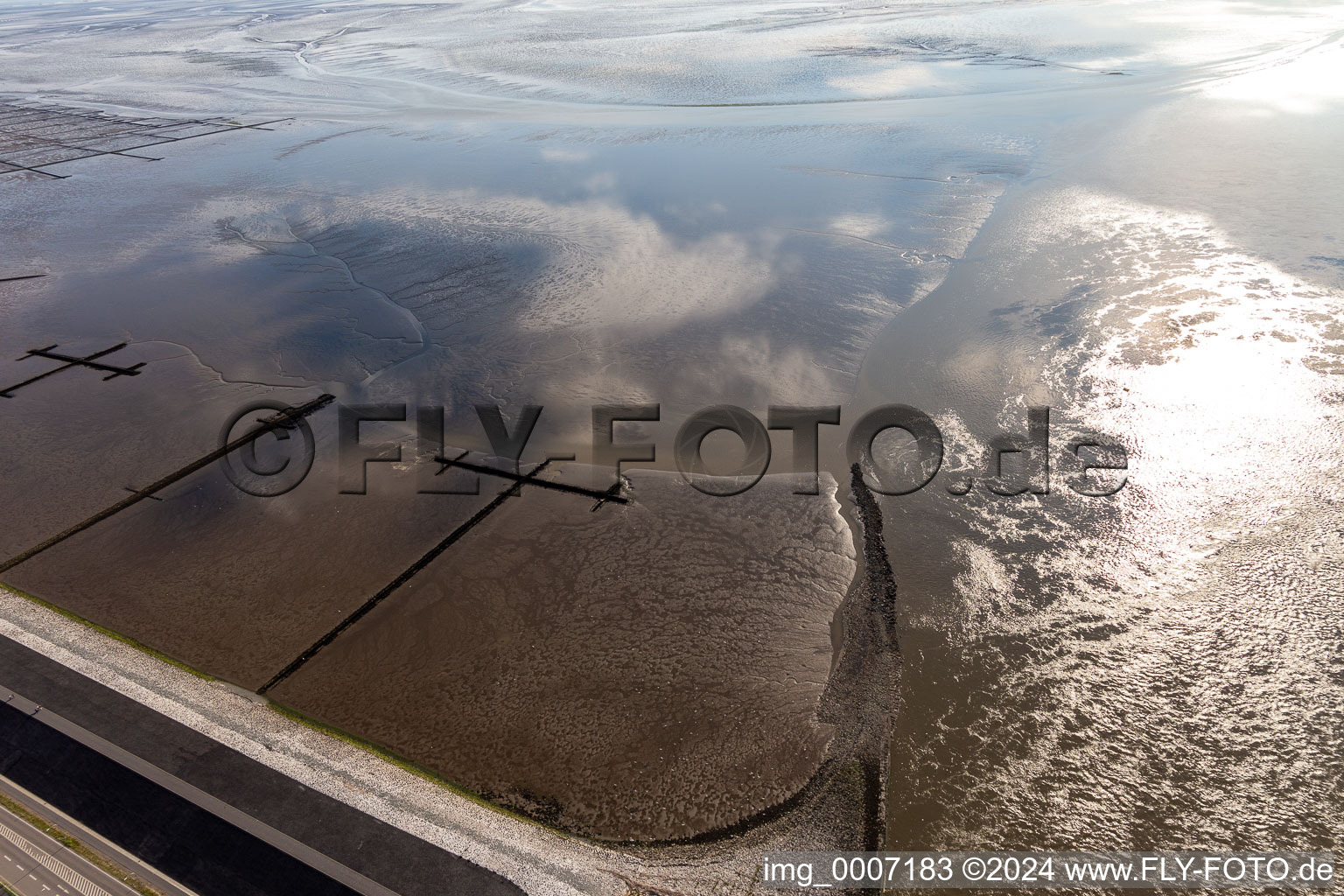 North Sea coast mudflats at the mouth of the Eider in Tönning in the state Schleswig Holstein, Germany