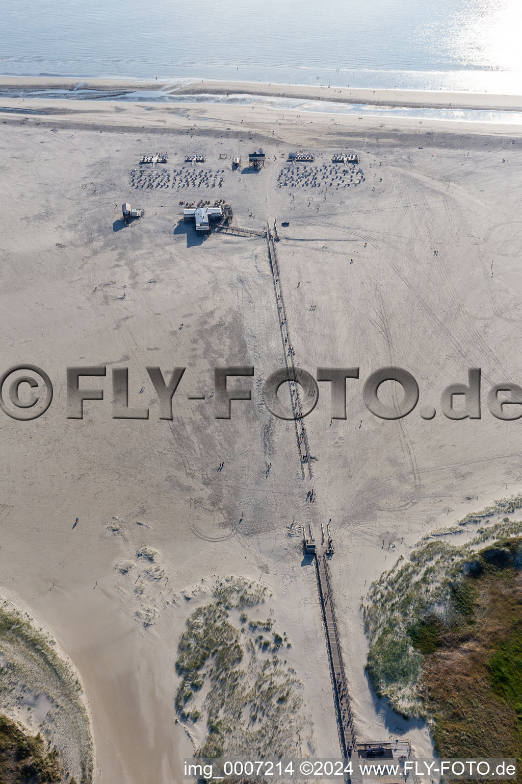 Aerial view of Sandy beach landscape on the North Sea - coast in the district of Sankt Peter-Ording Parking and gastronomy Die Seekiste in Sankt Peter-Ording in Schleswig-Holstein