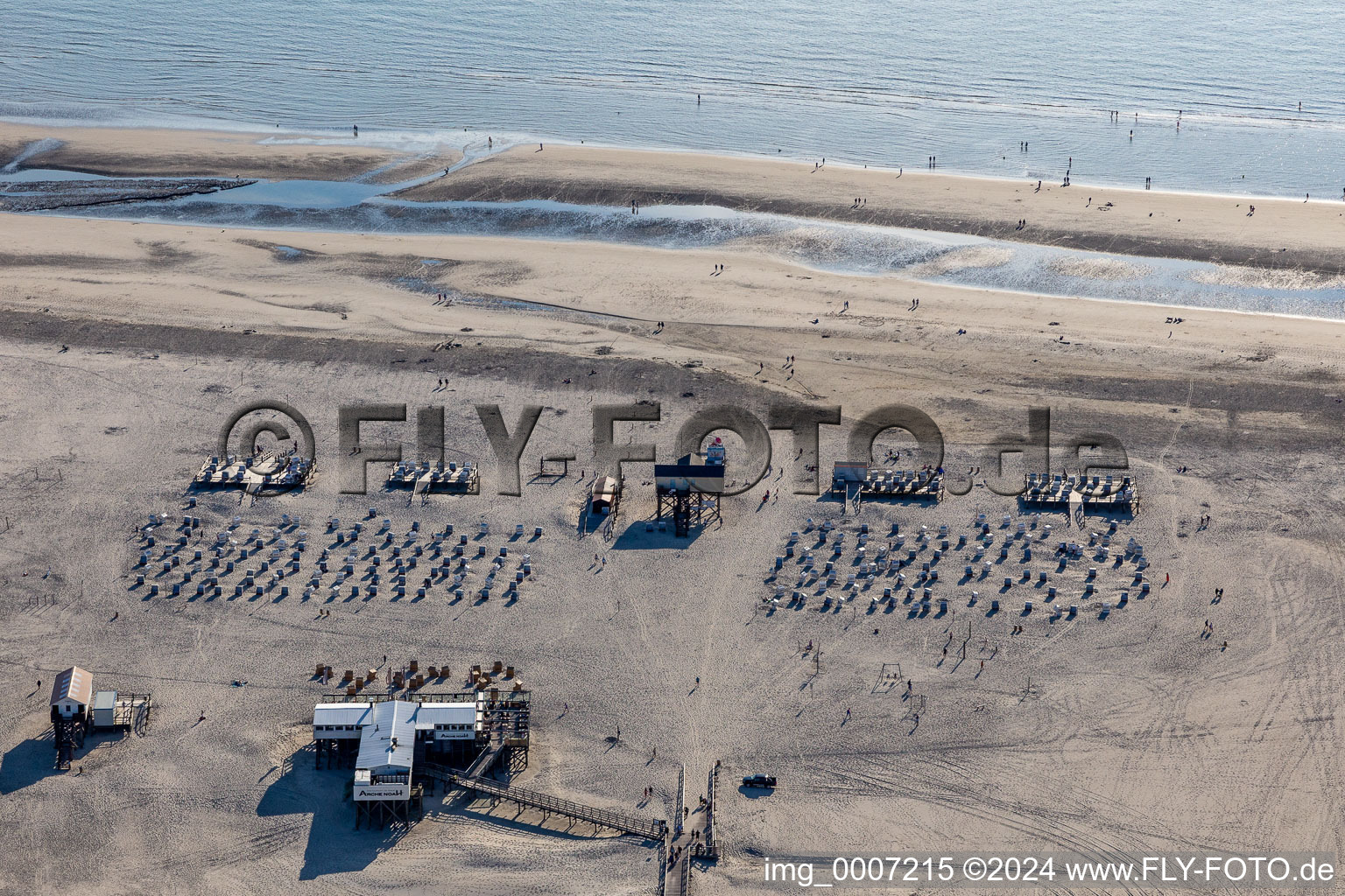 Aerial photograpy of Sandy beach landscape on the North Sea - coast in the district of Sankt Peter-Ording Parking and gastronomy Die Seekiste in Sankt Peter-Ording in Schleswig-Holstein