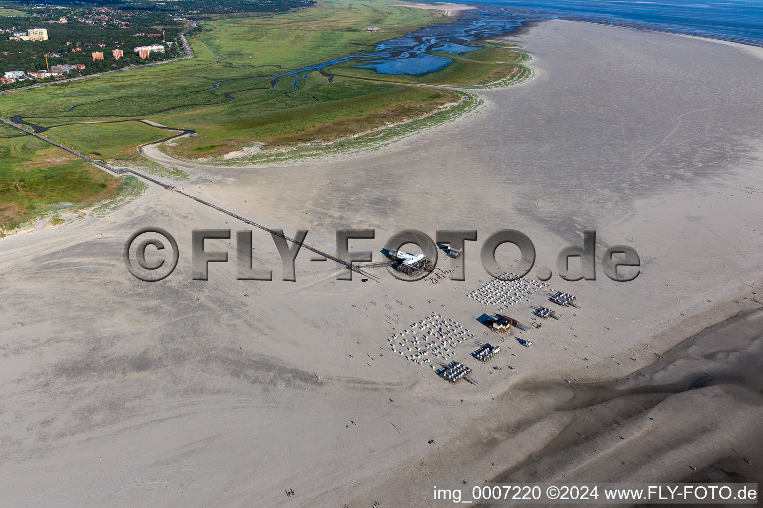 Coastline on the sandy beach of North Sea in Sankt Peter-Ording in the state Schleswig-Holstein, Germany