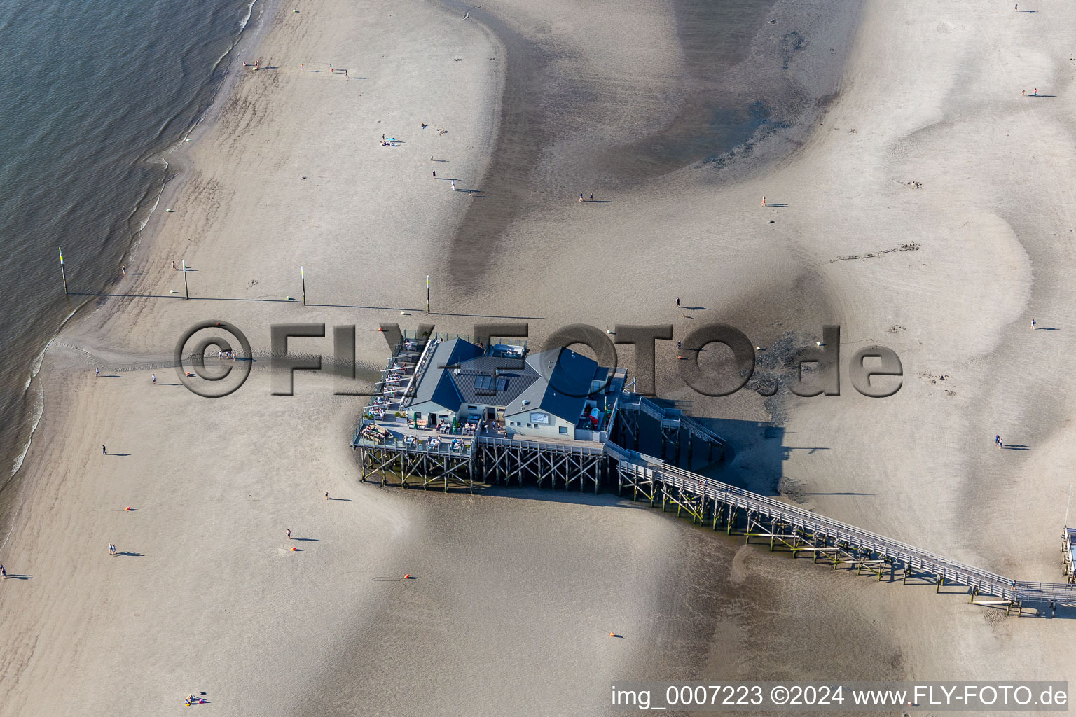 Oblique view of Coastline on the sandy beach of North Sea in Sankt Peter-Ording in the state Schleswig-Holstein, Germany