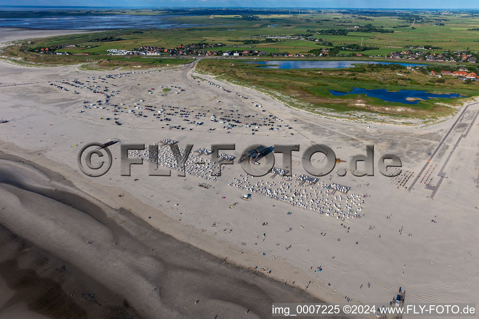 Beach chair on the sandy beach ranks in the coastal area of North Sea in the district Sankt Peter-Ording in Sankt Peter-Ording in the state Schleswig-Holstein, Germany