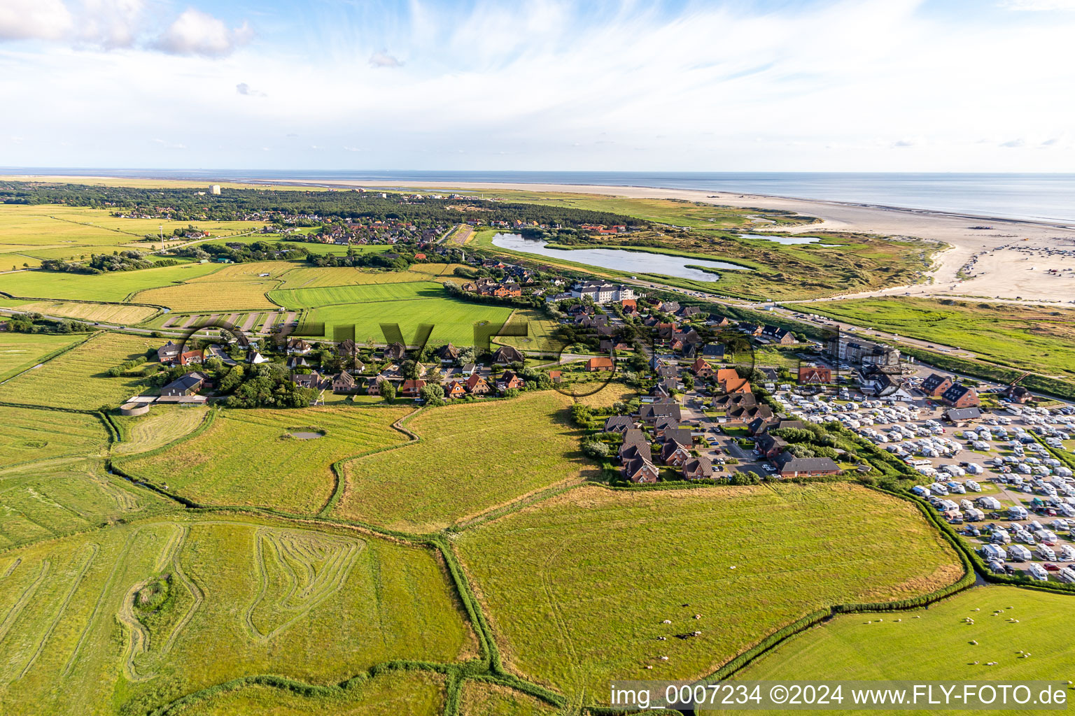 Aerial view of Campsite Biehl with caravans and tents on the beach of North Sea in Sankt Peter-Ording in the state Schleswig-Holstein, Germany