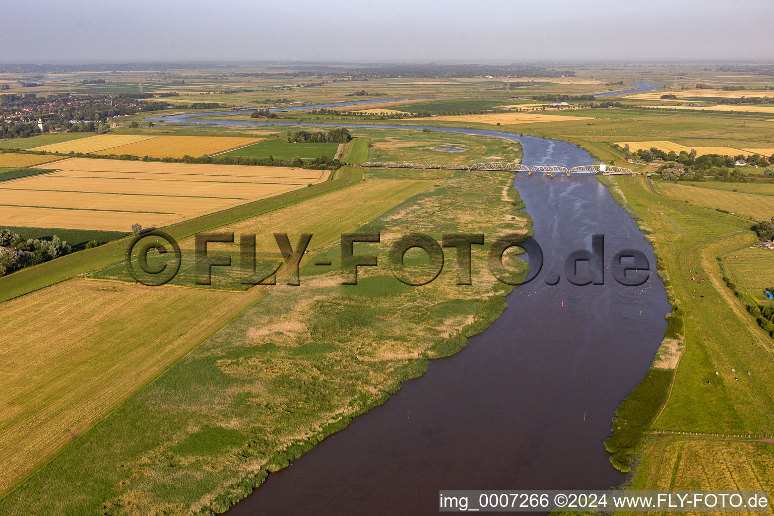 Aerial view of Railway - bridge crossing the Eider river in Dammsdeich in Koldenbuettel in the state Schleswig-Holstein, Germany