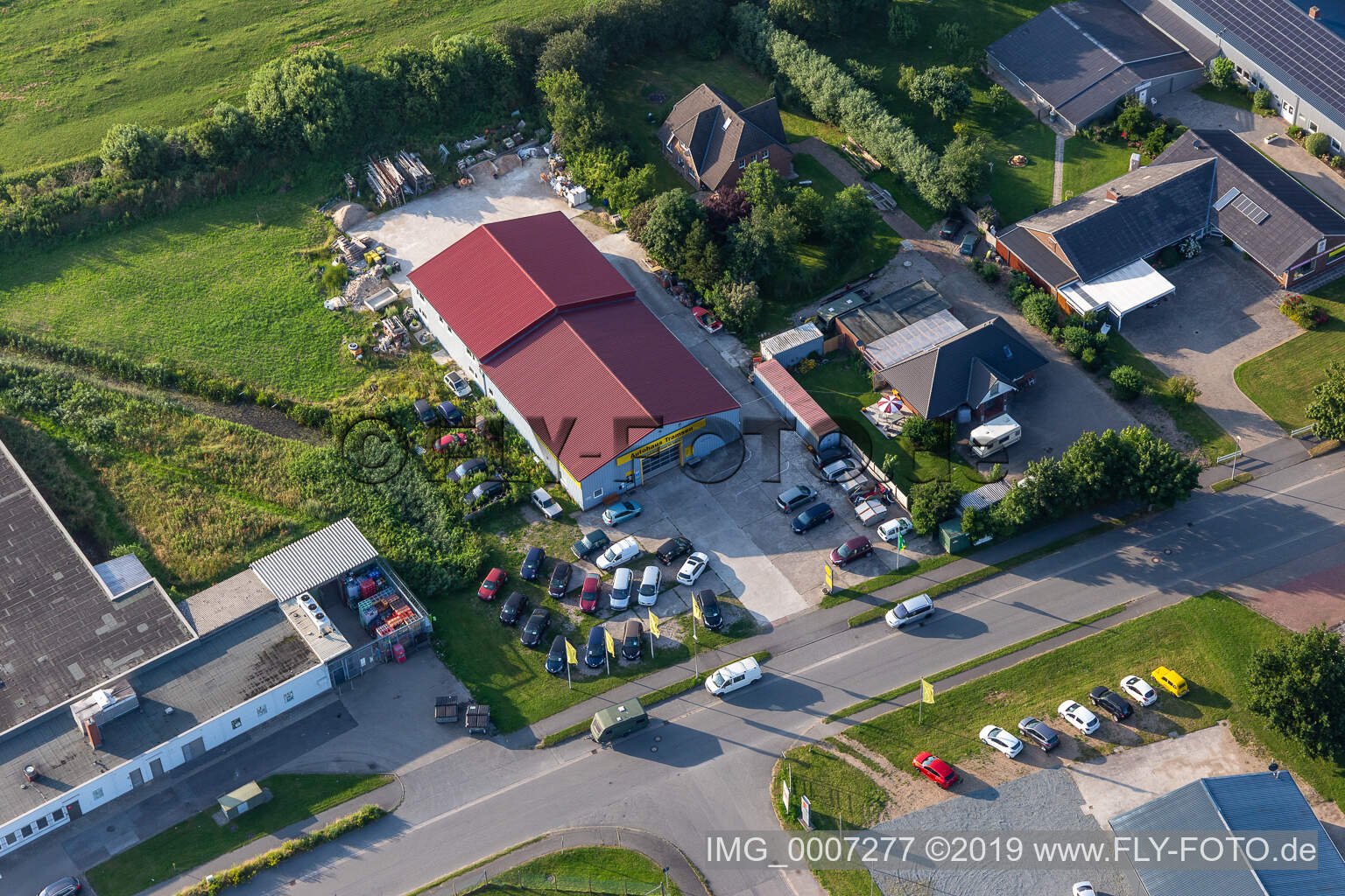 Aerial view of Commercial area Witzworter Straße Car dealership Tramsen in the district Hörn in Friedrichstadt in the state Schleswig Holstein, Germany