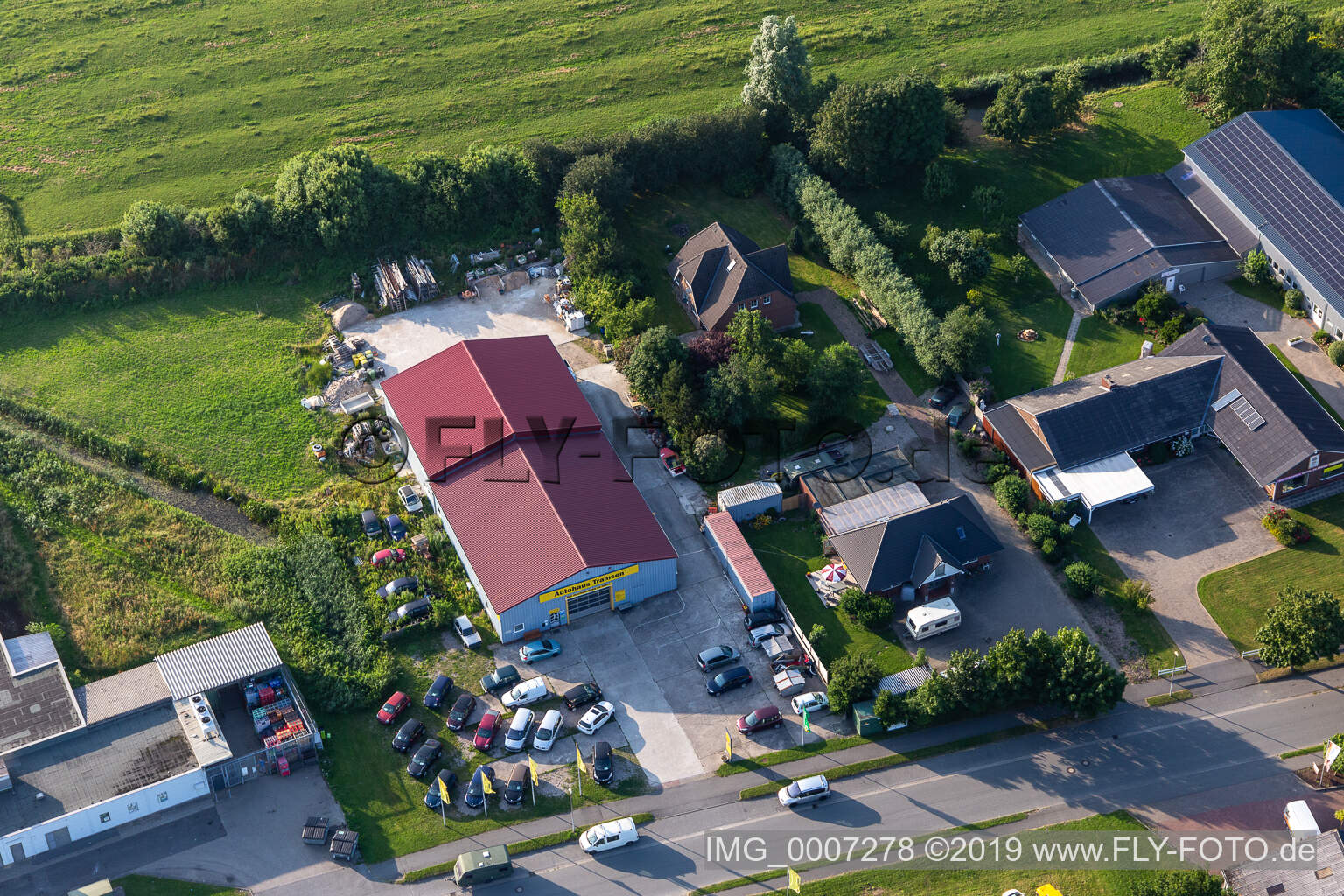 Aerial photograpy of Commercial area Witzworter Straße Car dealership Tramsen in the district Hörn in Friedrichstadt in the state Schleswig Holstein, Germany