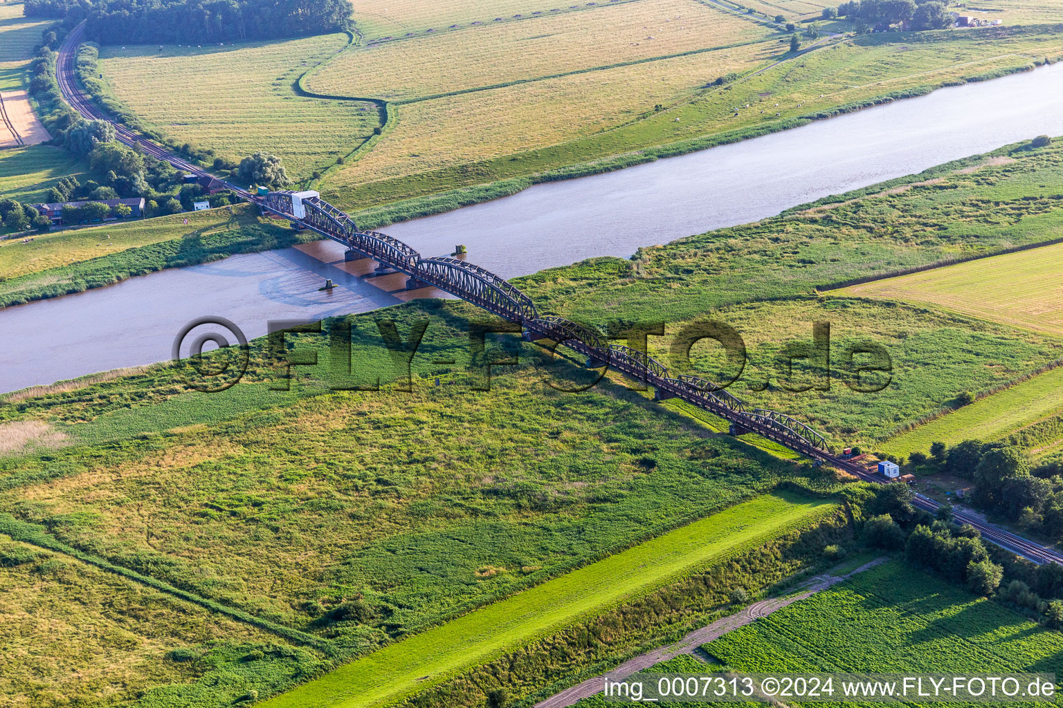 Aerial photograpy of Railway - bridge crossing the Eider river in Dammsdeich in Koldenbuettel in the state Schleswig-Holstein, Germany