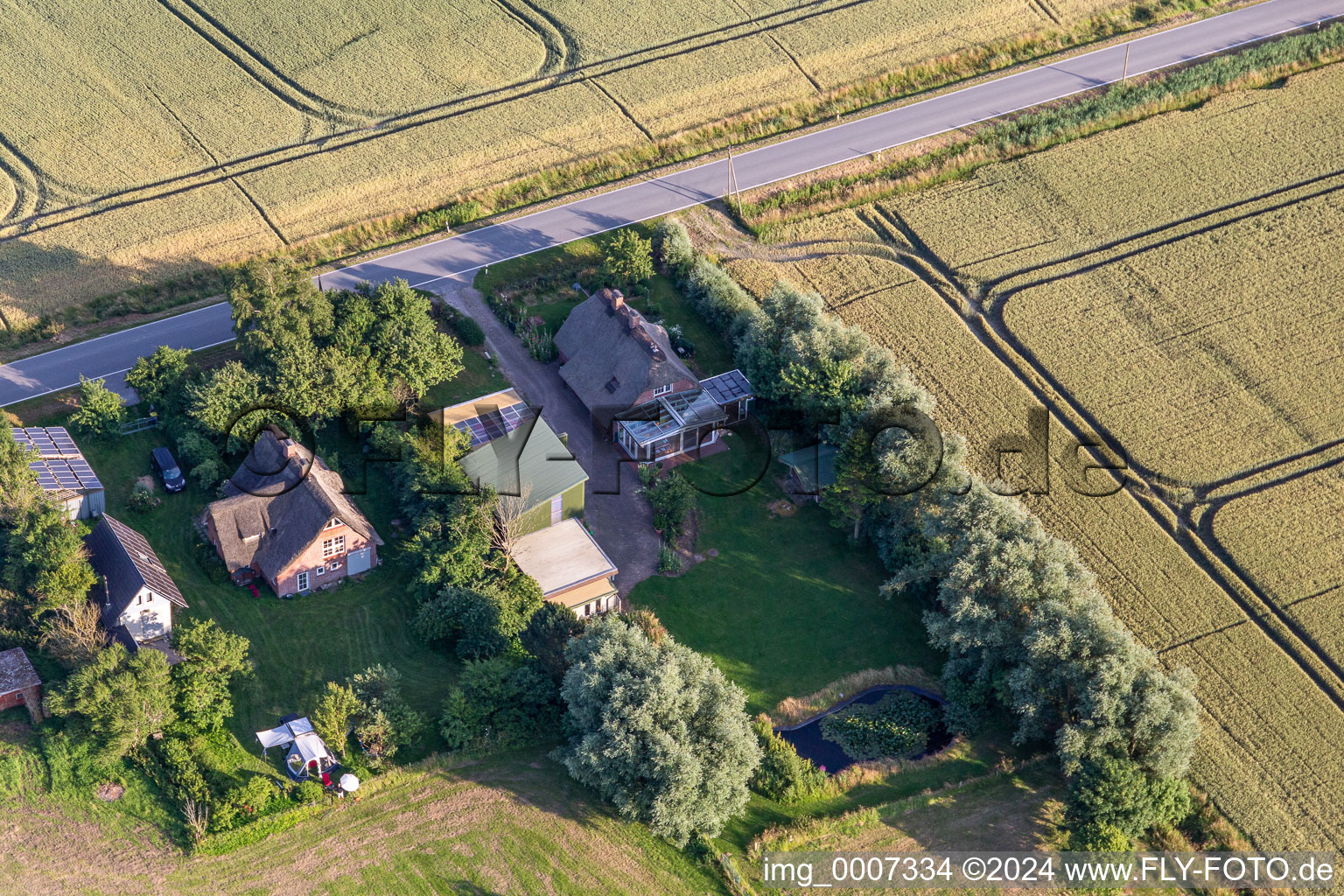 Bird's eye view of Former dike keeper's farms on Schülpersieler Straße in Wesselburenerkoog in the state Schleswig Holstein, Germany