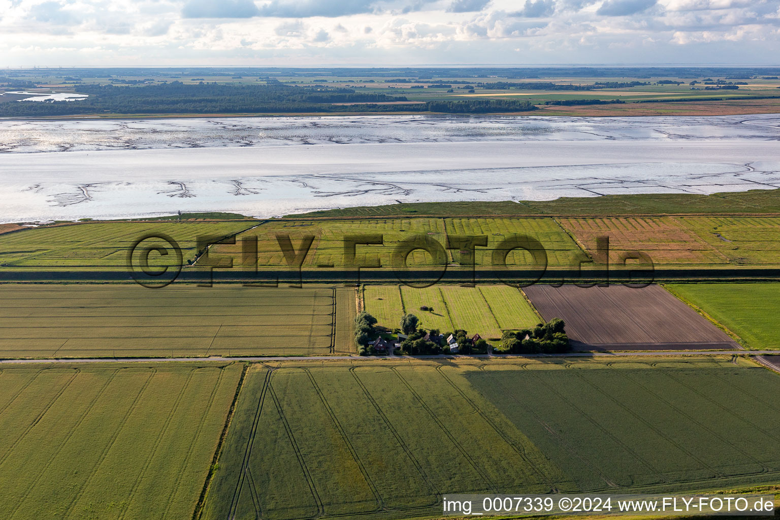 Drone recording of Former dike keeper's farms on Schülpersieler Straße in Wesselburenerkoog in the state Schleswig Holstein, Germany