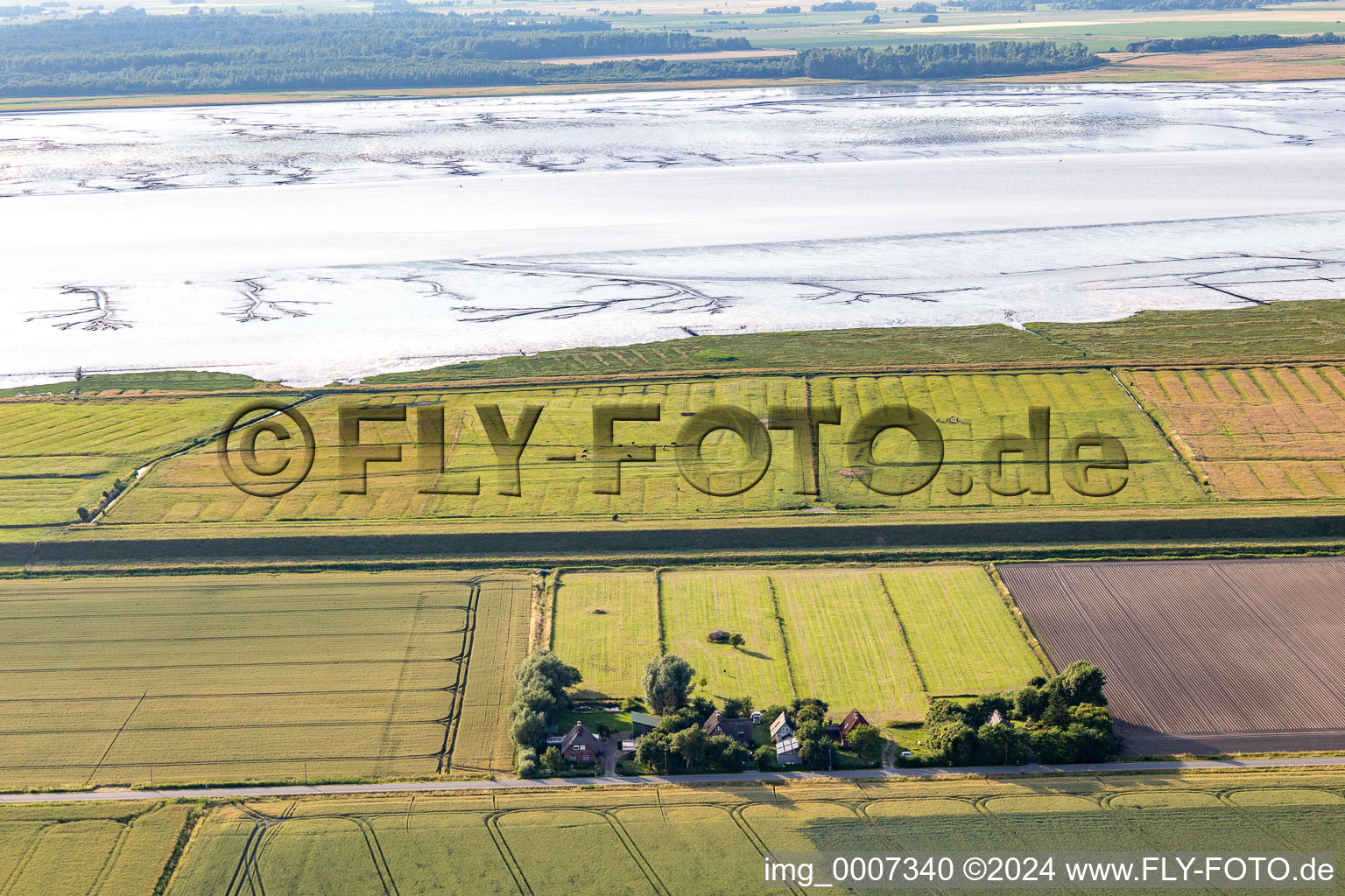 Drone image of Former dike keeper's farms on Schülpersieler Straße in Wesselburenerkoog in the state Schleswig Holstein, Germany