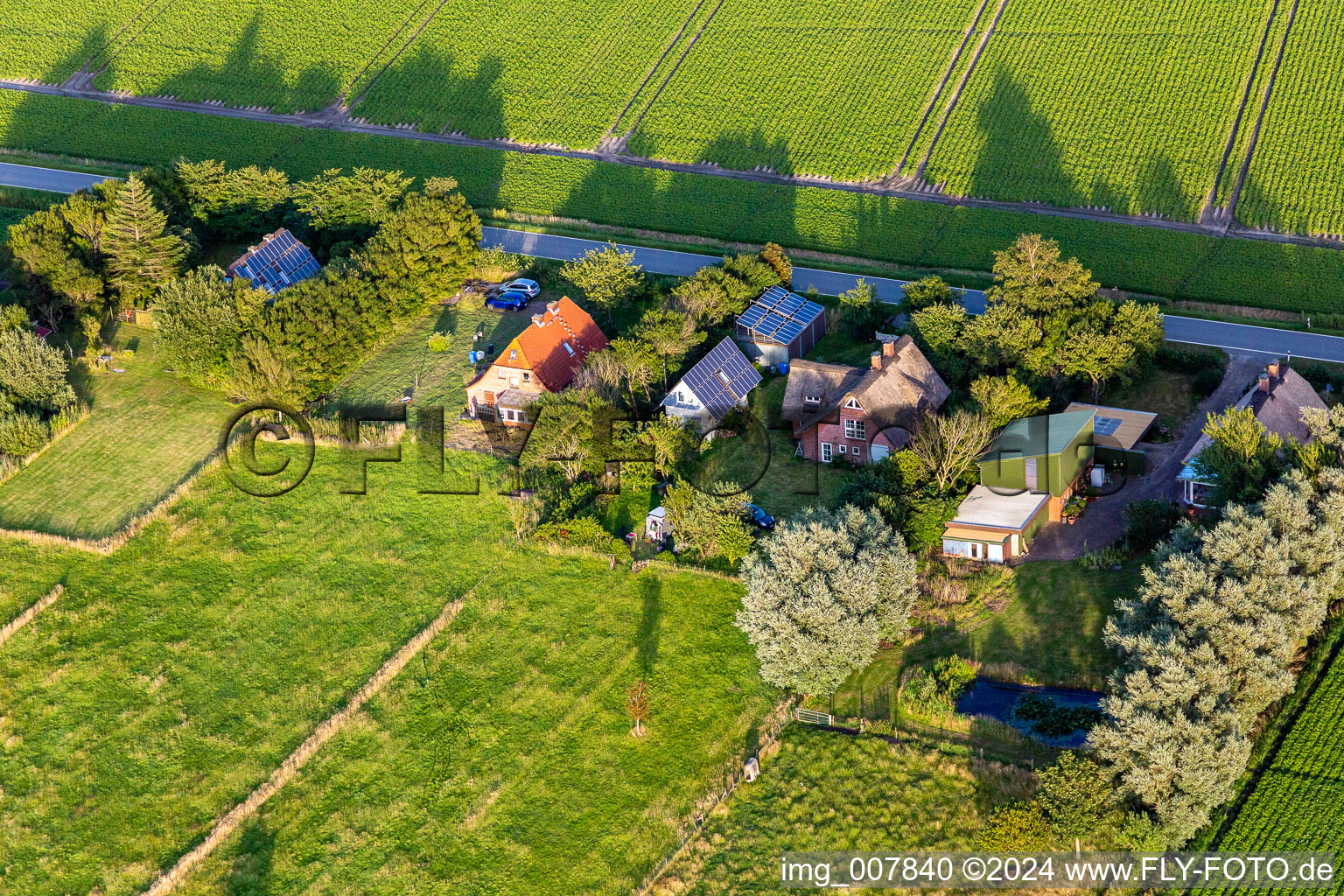 Schülpersieler Street in Wesselburenerkoog in the state Schleswig Holstein, Germany from above