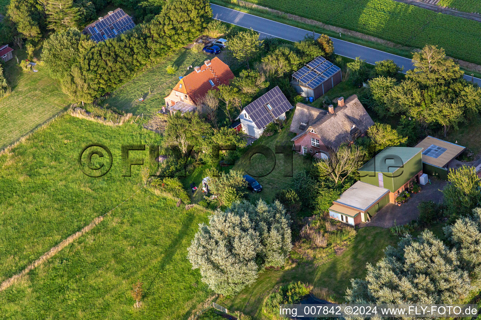 Schülpersieler Street in Wesselburenerkoog in the state Schleswig Holstein, Germany seen from above