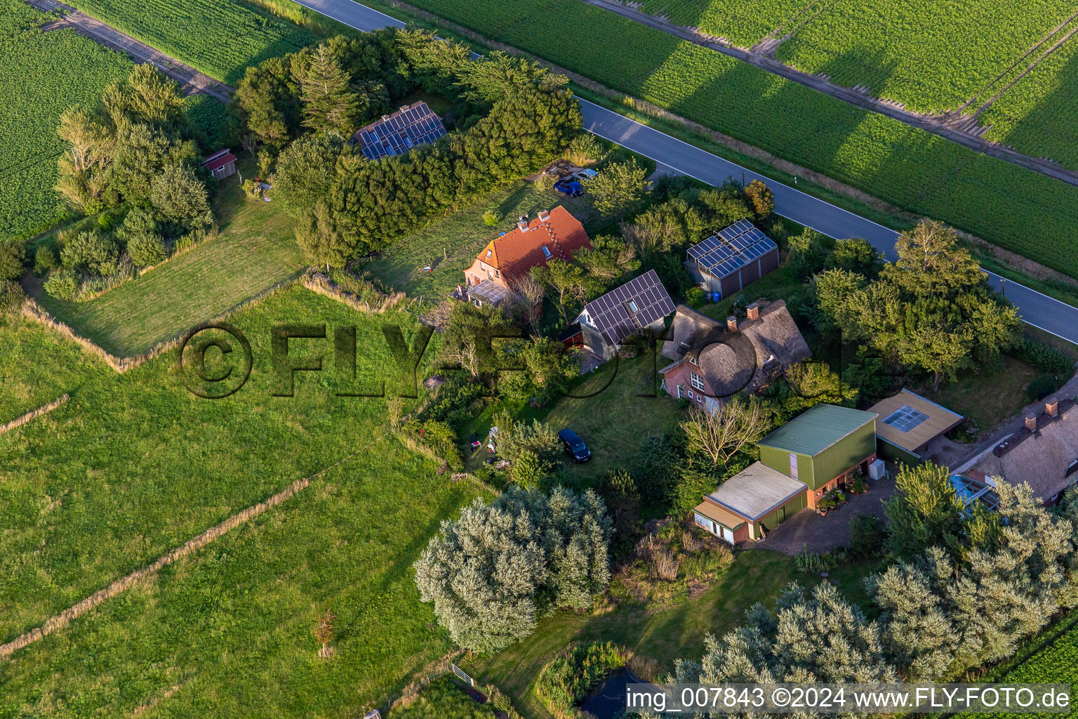 Schülpersieler Straße in Wesselburenerkoog in the state Schleswig Holstein, Germany from the plane