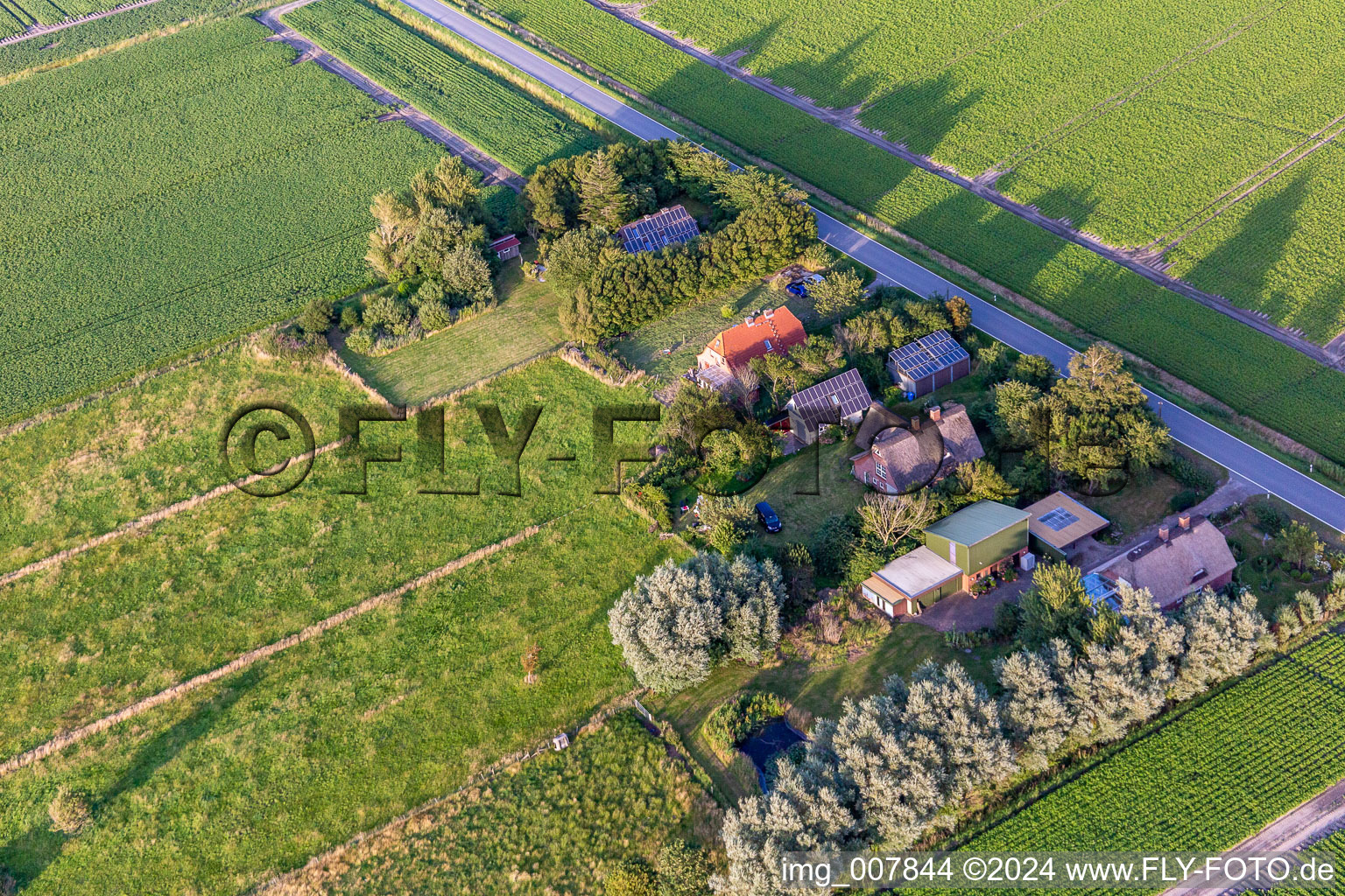 Bird's eye view of Schülpersieler Straße in Wesselburenerkoog in the state Schleswig Holstein, Germany