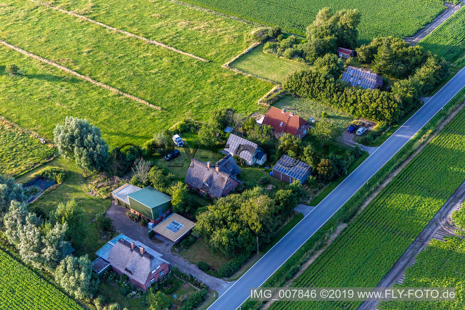 Drone recording of Schülpersieler Straße in Wesselburenerkoog in the state Schleswig Holstein, Germany