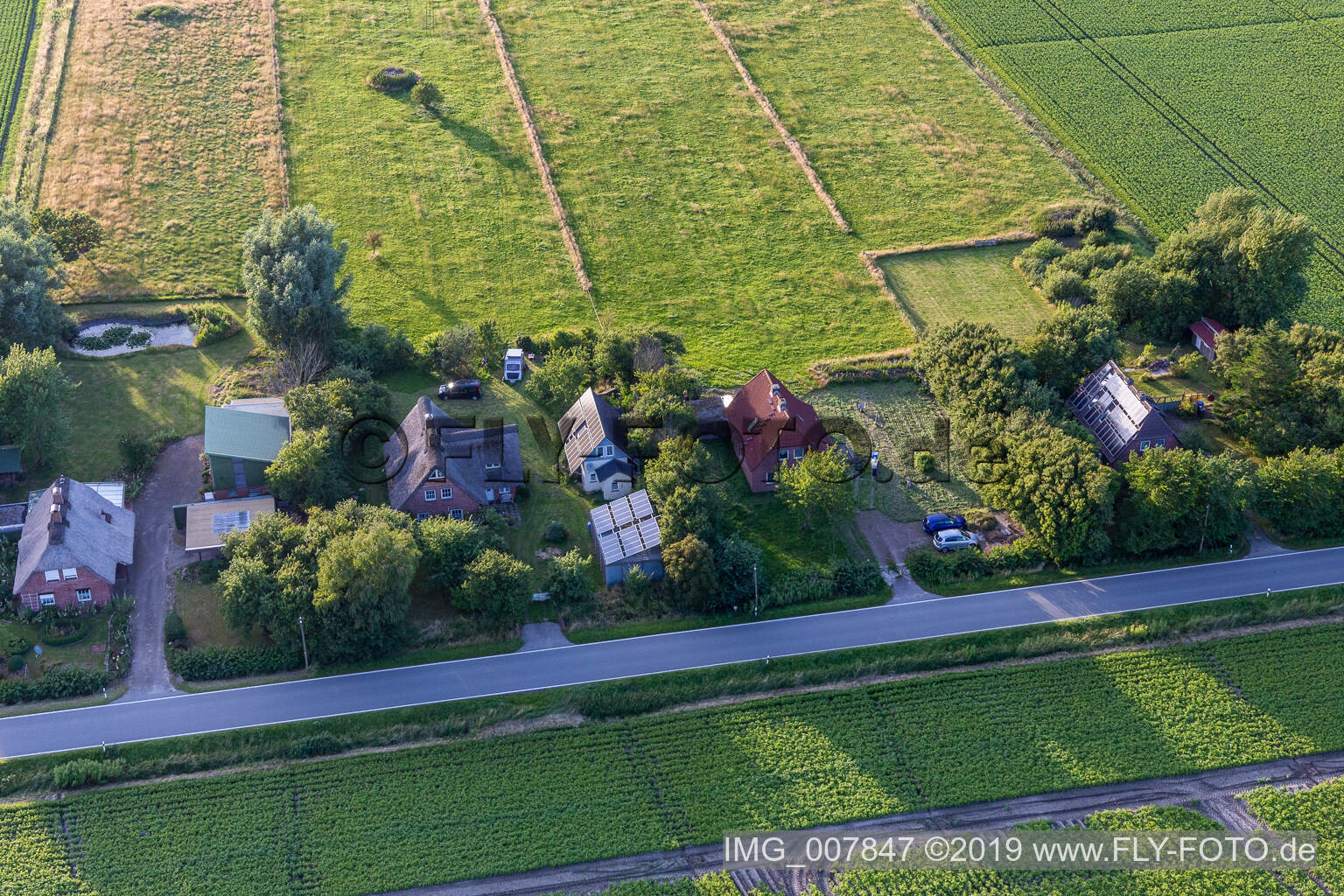 Drone image of Schülpersieler Straße in Wesselburenerkoog in the state Schleswig Holstein, Germany