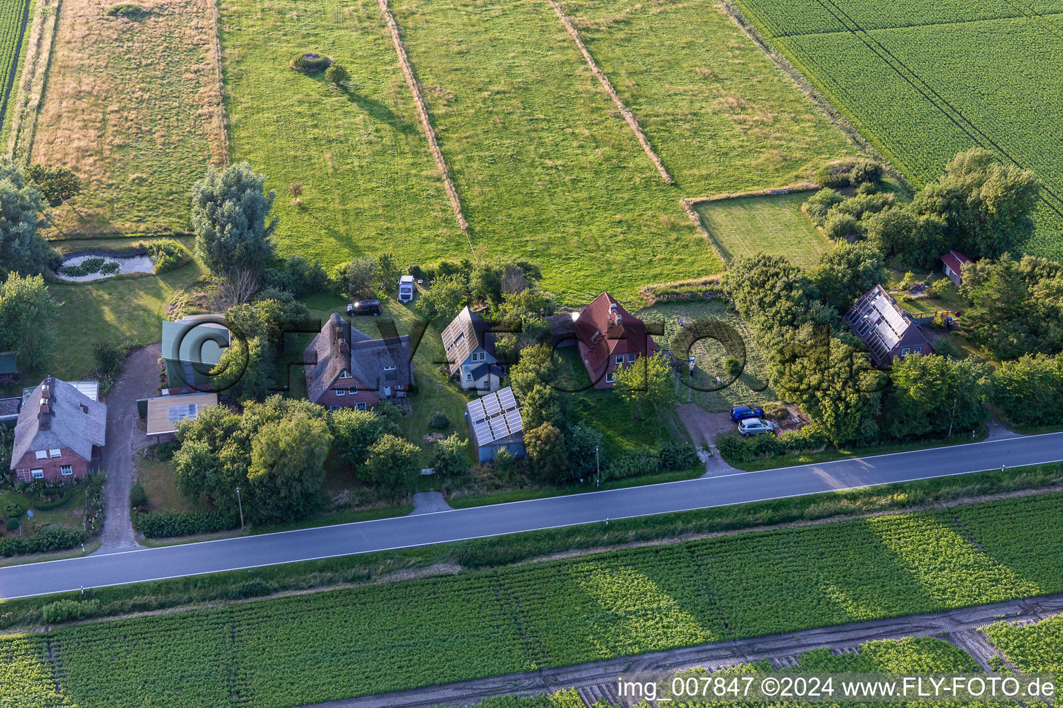 Drone image of Schülpersieler Street in Wesselburenerkoog in the state Schleswig Holstein, Germany