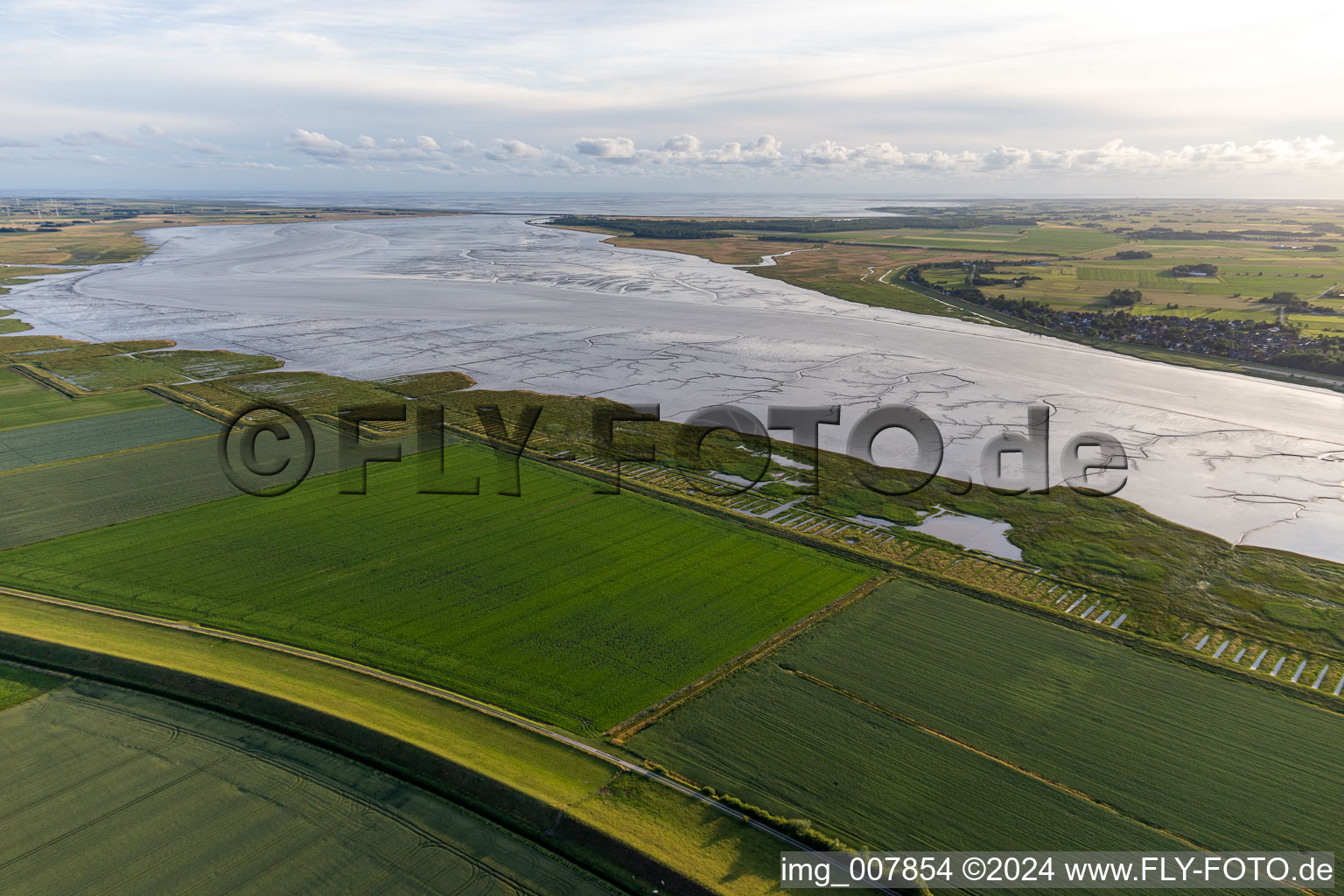 Formation of tidal creeks on the bank areas with mud flats along the river of Eiof in Toenning in the state Schleswig-Holstein, Germany