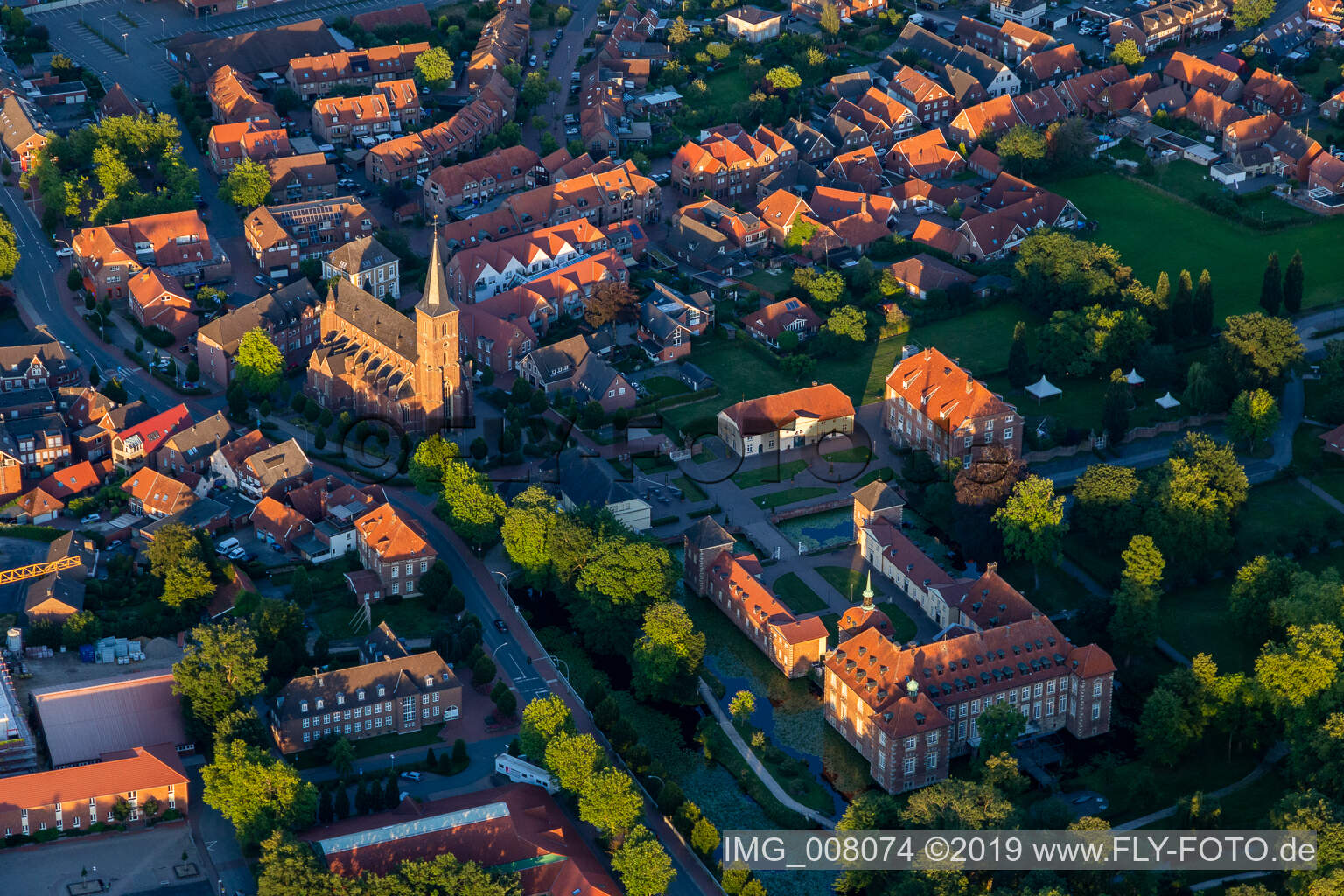 Aerial view of Chateauform sports castle Velen and church of St. Peter and Paul in Velen in the state North Rhine-Westphalia, Germany
