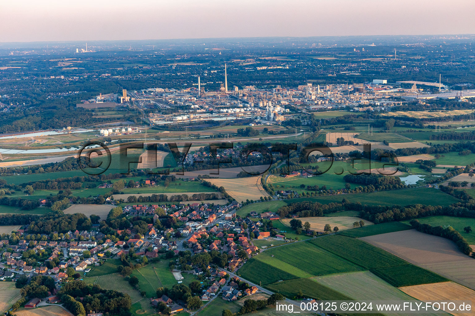 Village view on the edge of agricultural fields and land in Lippramsdorf in the state North Rhine-Westphalia, Germany