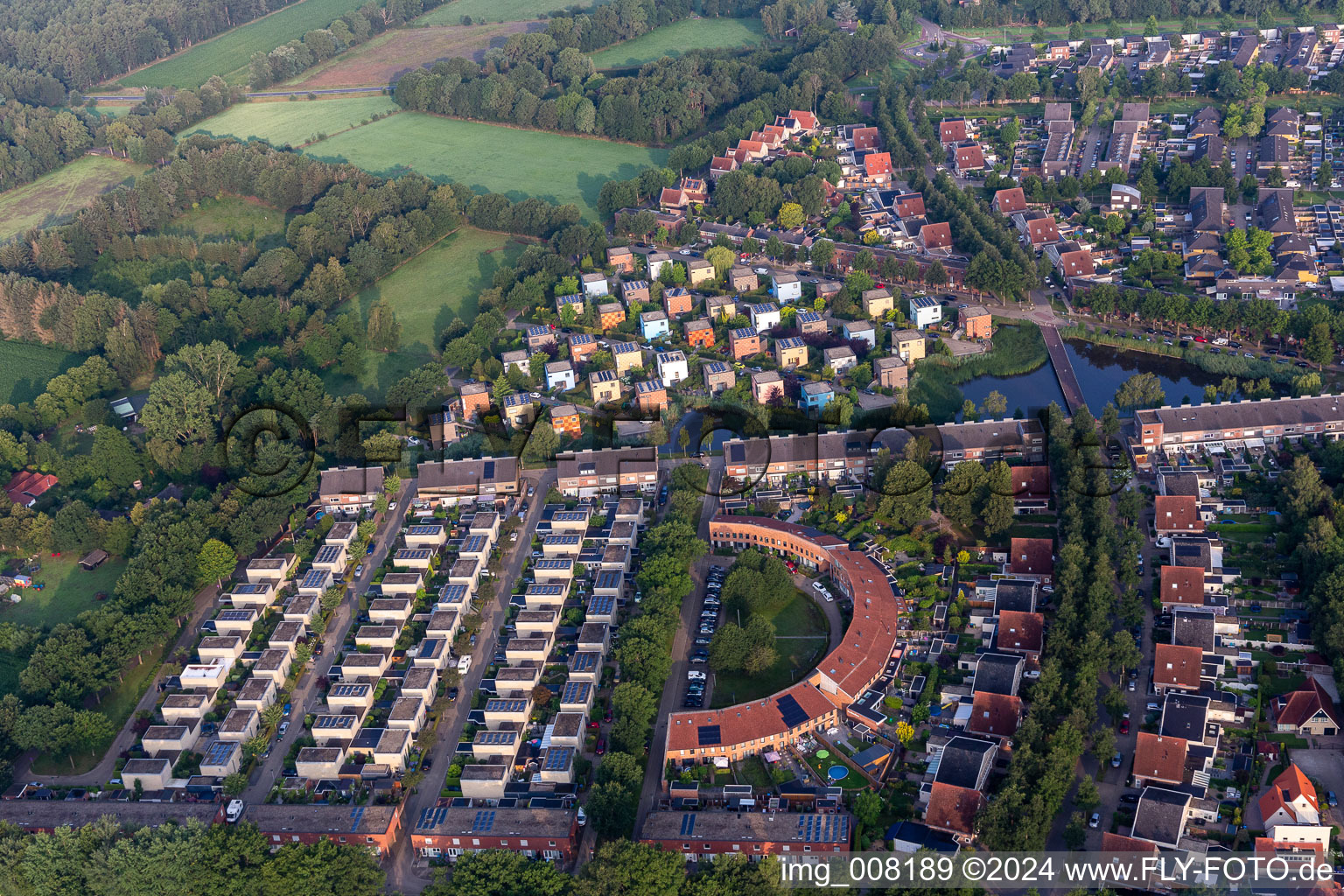 Residential area of coloured, cube-shapres, single-family design houses in settlement at shore areas in Enschede in Overijssel, Netherlands