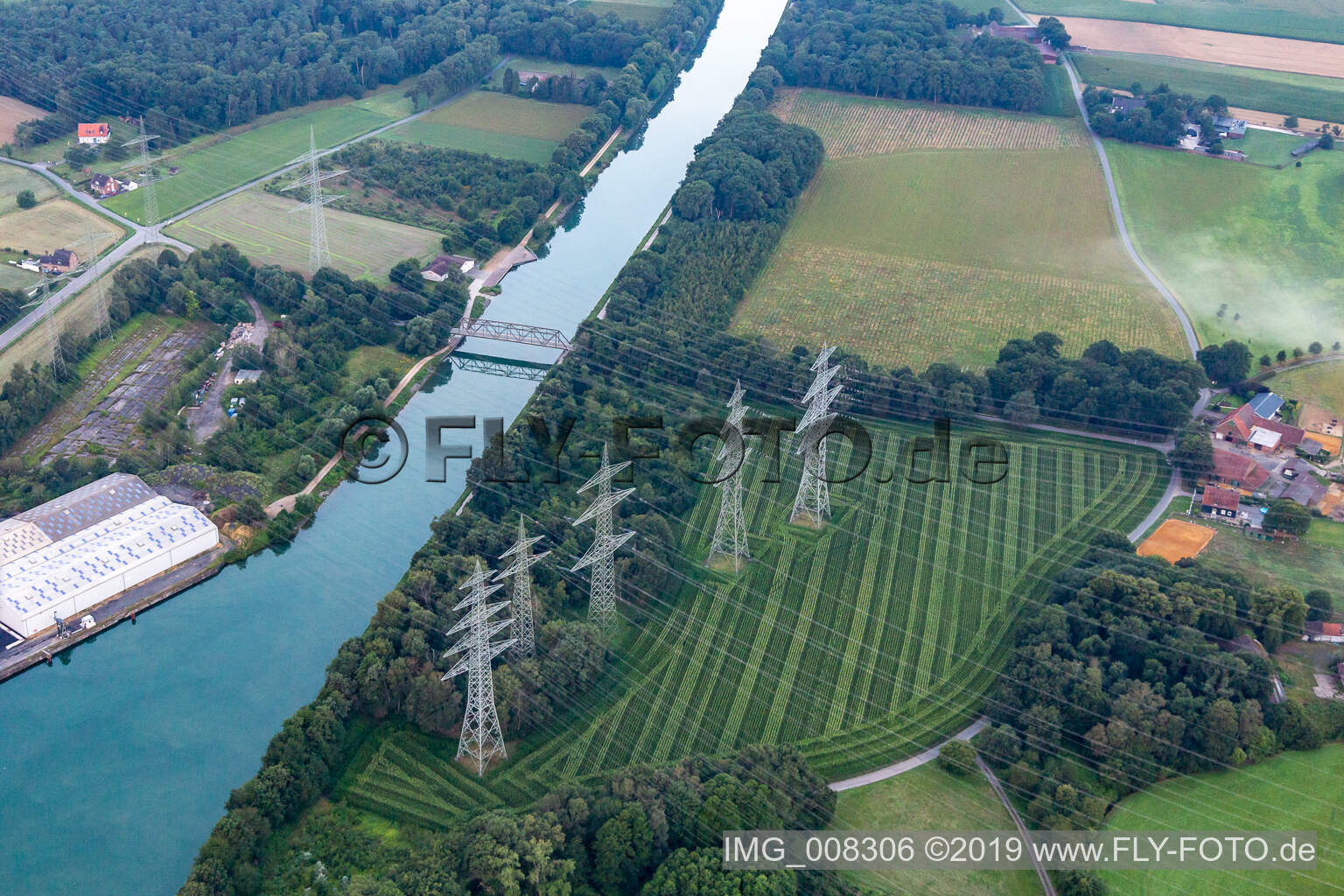 High-voltage lines cross the Wesel-Datteln Canal in Marl in the state North Rhine-Westphalia, Germany