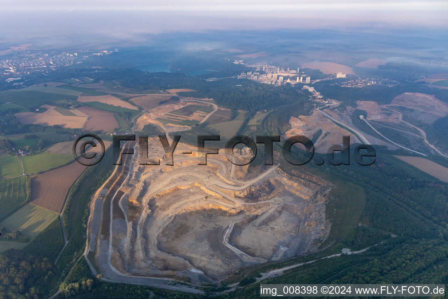 Oblique view of Rütkausen opencast mine of the Lhoist Rheinkalk plant in Flandersbach in Wülfrath in the state North Rhine-Westphalia, Germany