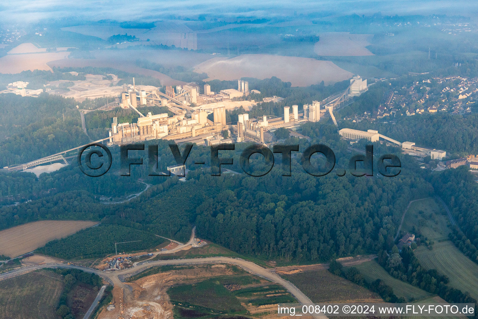 Rütkausen opencast mine of the Lhoist Rheinkalk plant in Flandersbach in Wülfrath in the state North Rhine-Westphalia, Germany seen from above