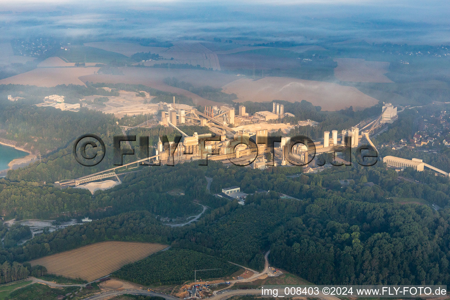 Aerial view of Site and Terrain of overburden surfaces Cement opencast mining in Wuelfrath in the state North Rhine-Westphalia, Germany