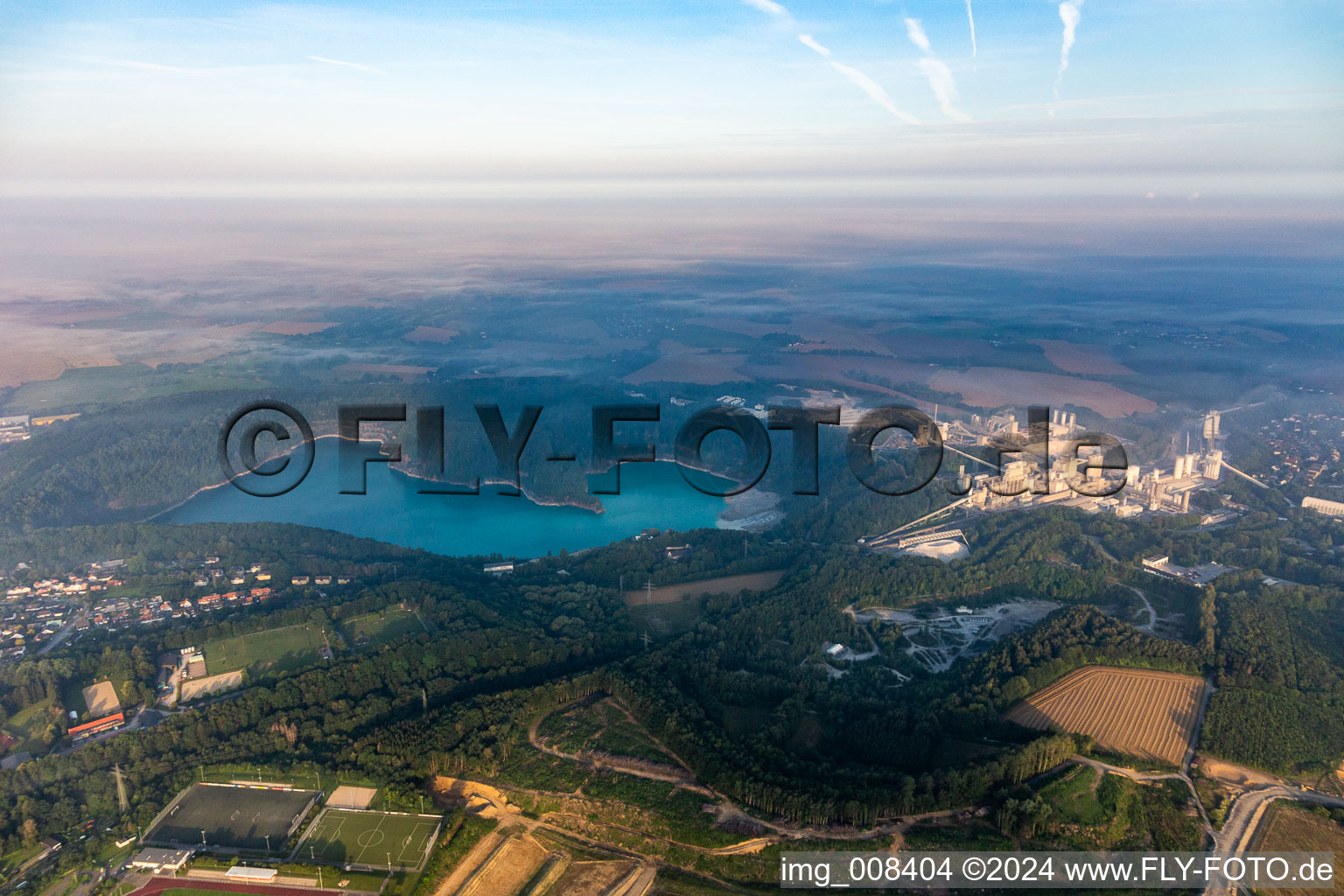 Rütkausen opencast mine of the Lhoist Rheinkalk plant in Flandersbach in Wülfrath in the state North Rhine-Westphalia, Germany seen from above