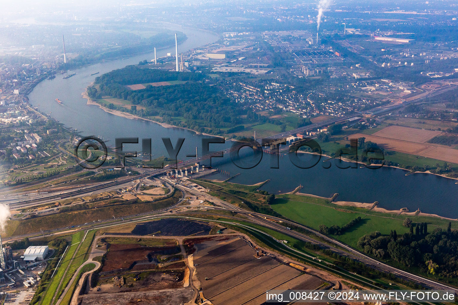 Routing and traffic lanes over the highway bridge crossing the Rhine in the motorway A 1 from Leverkusen in front of the FORD car factory in the district Niehl in Cologne in the state North Rhine-Westphalia, Germany