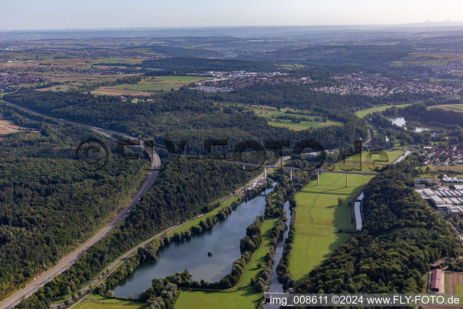 River - bridge construction crossing the Neckar valley and a lake in Kirchentellinsfurt in the state Baden-Wuerttemberg, Germany
