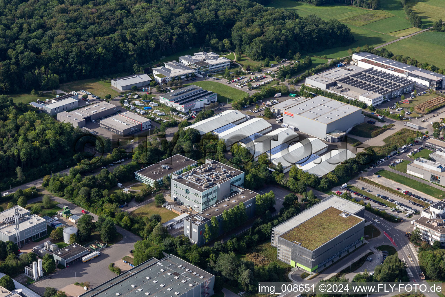 Industrial and commercial area with Akzo Nobel Powder Coatings GmbH, RET GmbH and Möbel Rieger Lager Reutlingen in the district Jettenburg in Kusterdingen in the state Baden-Wuerttemberg, Germany