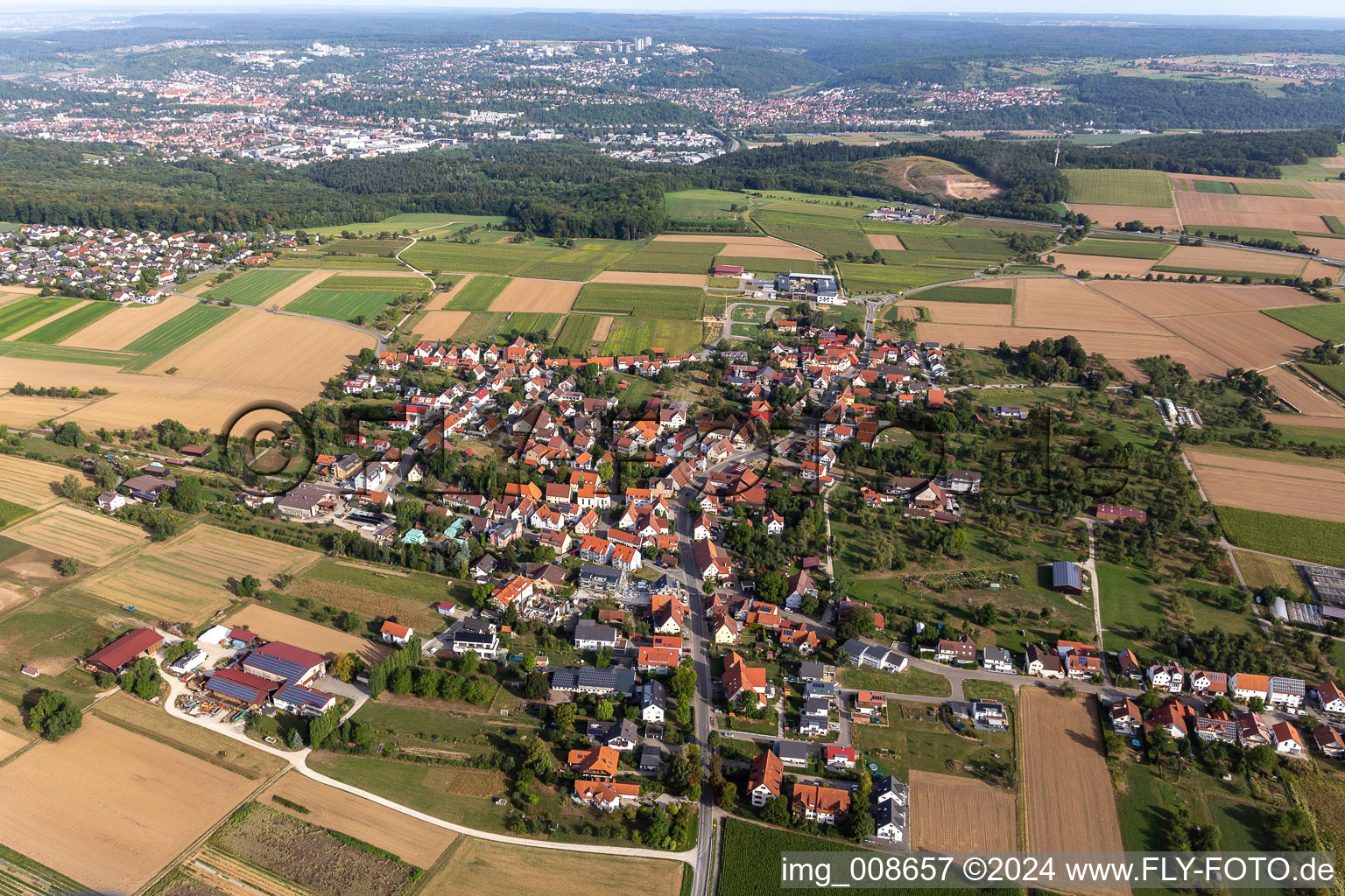 Agricultural land and field borders surround the settlement area of the village in Wankheim in the state Baden-Wuerttemberg, Germany