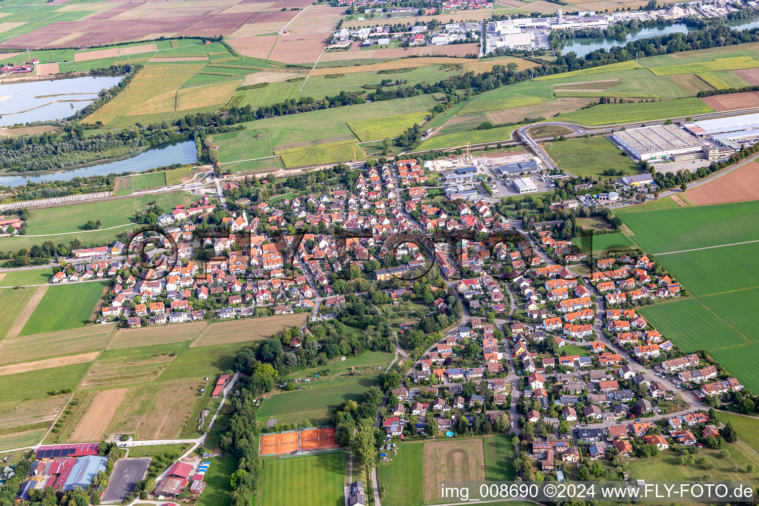 View of the village on the edge of agricultural fields and farmland in the district Bühl in Tübingen in the state Baden-Wuerttemberg, Germany