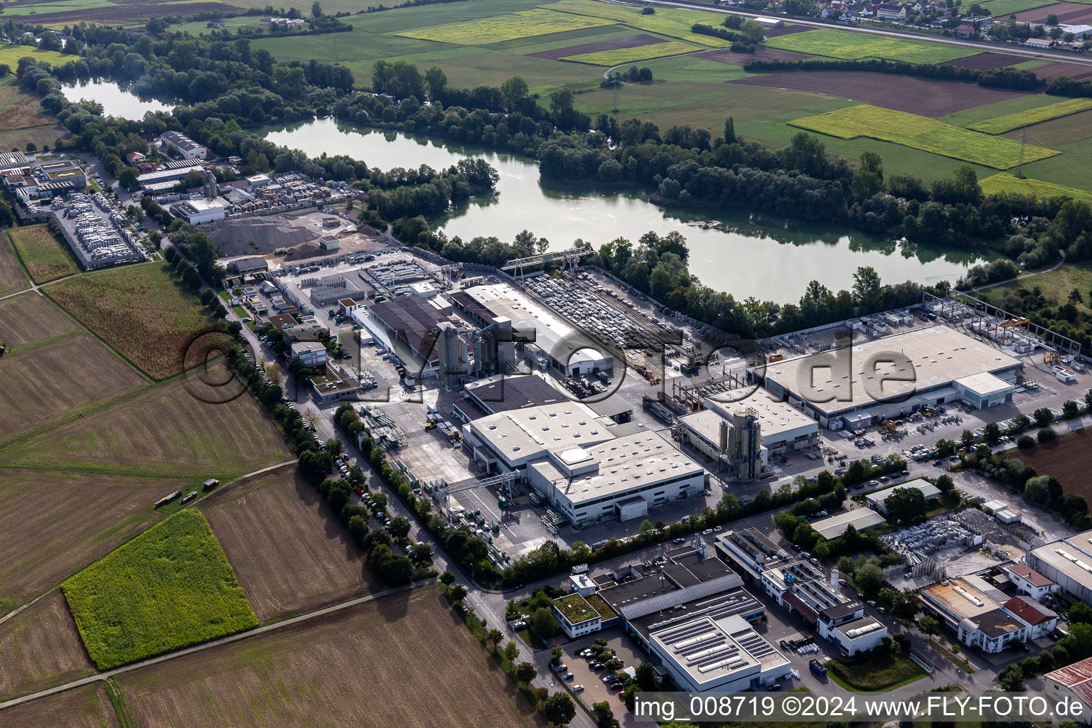 Industrial and commercial area on Baggersee with Wabra GmbH, Aicheler & Braun GmbH, Betonwerk, Flonmer Bauunternehmung, Haendle Haerterei GmbH,Beton Kemmler GmbH, in Hirschau in the state Baden-Wuerttemberg, Germany