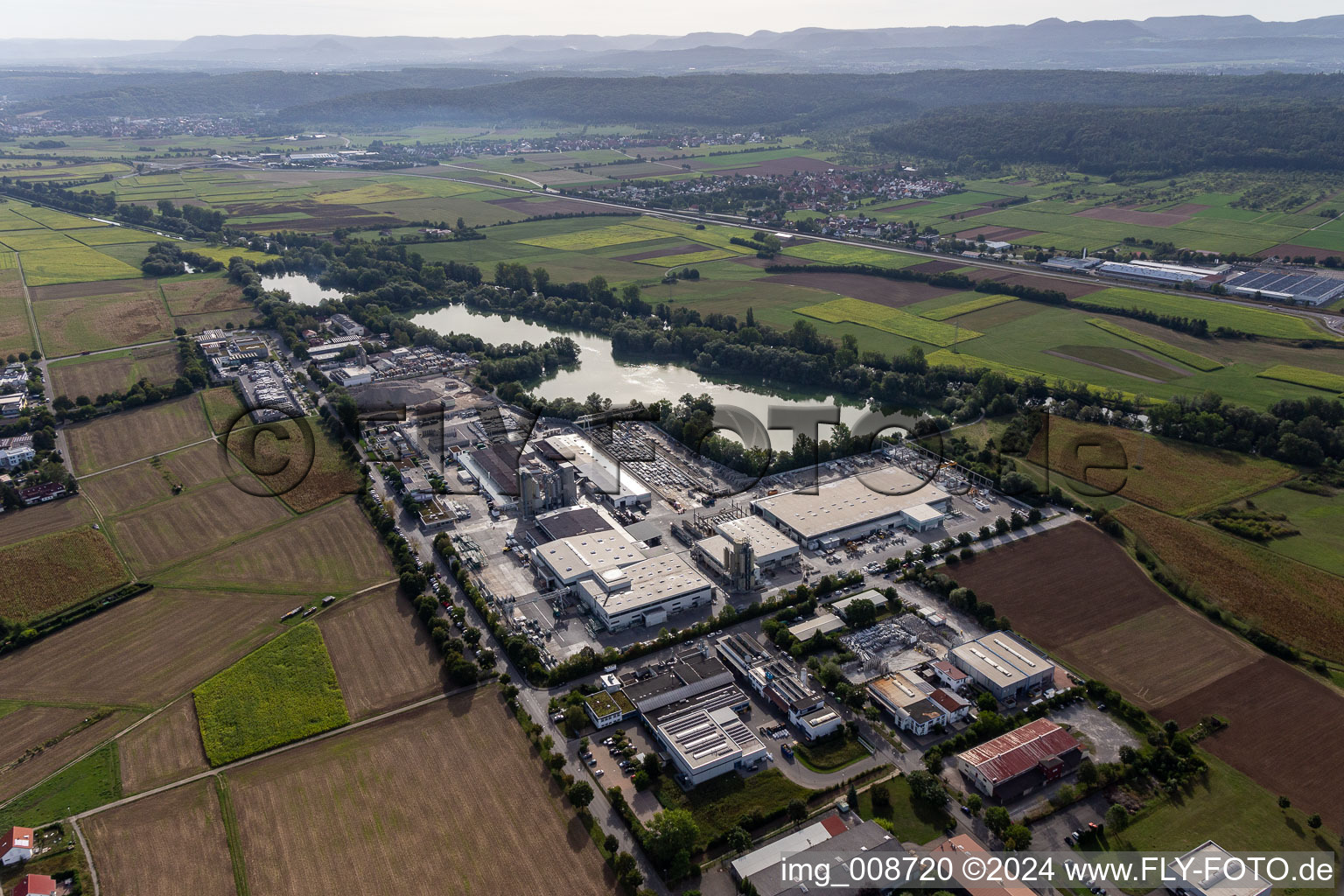 Aerial view of Industrial and commercial area on Baggersee with Wabra GmbH, Aicheler & Braun GmbH, Betonwerk, Flonmer Bauunternehmung, Haendle Haerterei GmbH,Beton Kemmler GmbH, in Hirschau in the state Baden-Wuerttemberg, Germany