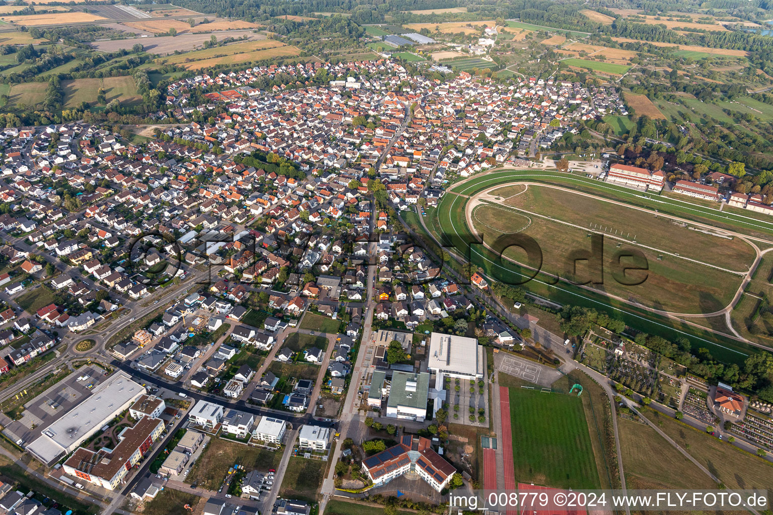 Racetrack racecourse - trotting Rennbahn Iffezheim in Iffezheim in the state Baden-Wuerttemberg, Germany from above