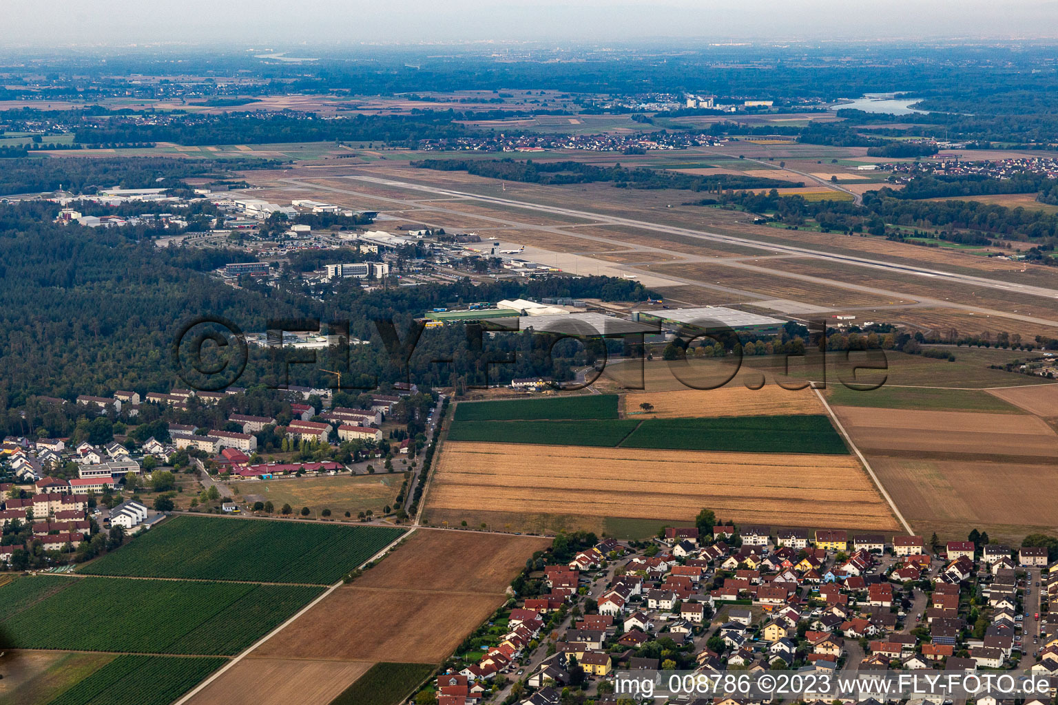 Runway with hangar taxiways and terminals on the grounds of the airport Karlsruhe / Baden-Baden (FKB) in Rheinmuenster in the state Baden-Wuerttemberg, Germany