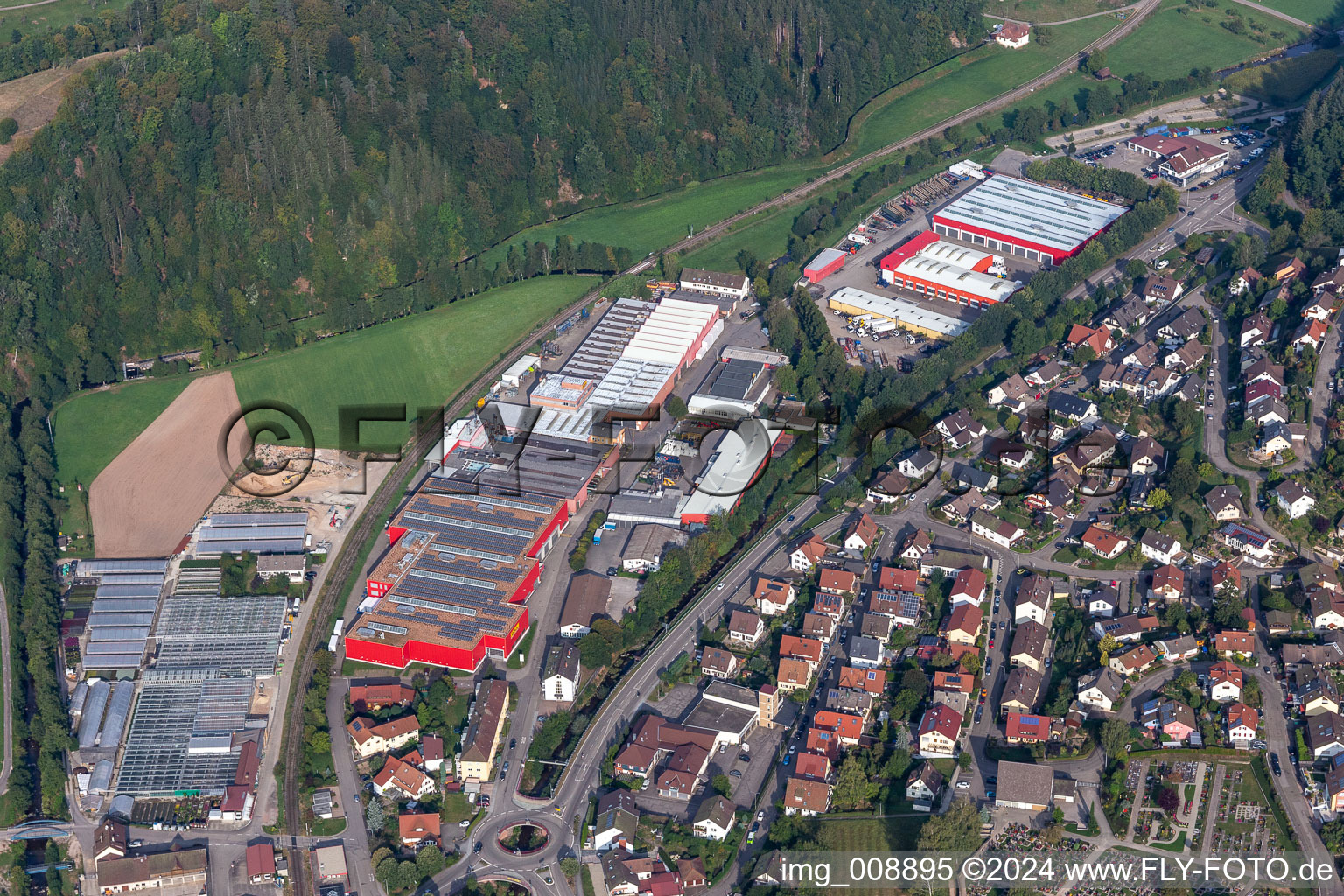 Aerial photograpy of Buildings and production halls on the vehicle construction site of DOLL Fahrzeugbau GmbH in Oppenau in the state Baden-Wuerttemberg, Germany