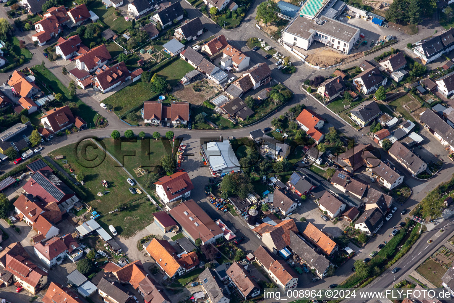 Aerial view of Agricultural machinery in the district Ebersweier in Durbach in the state Baden-Wuerttemberg, Germany