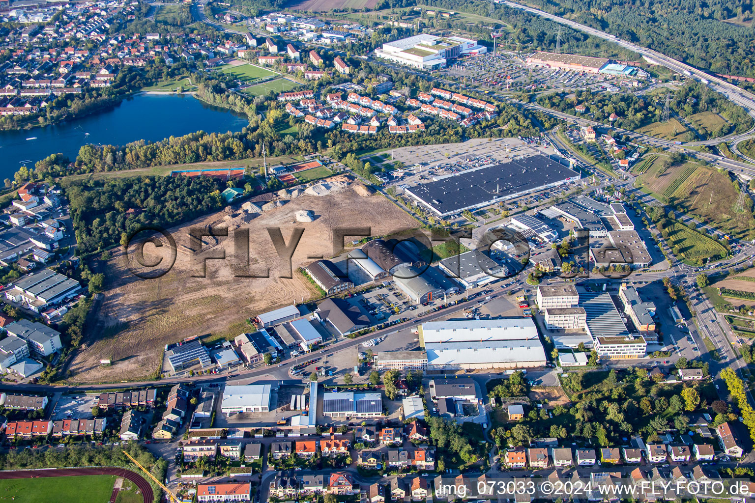 New building construction site in the industrial parkSchuette-Lanz-Park in Bruehl in the state Baden-Wurttemberg seen from above